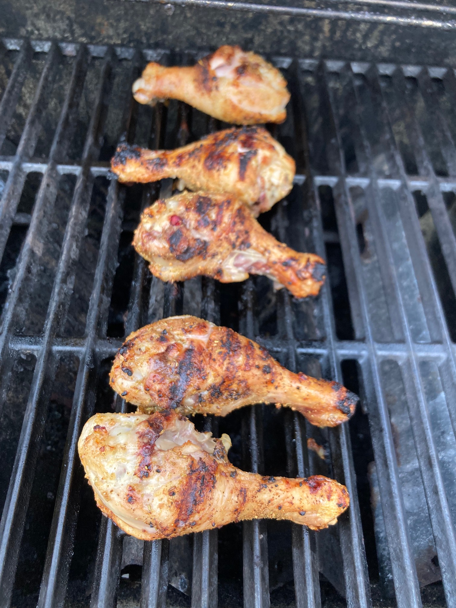 Chicken legs on grill