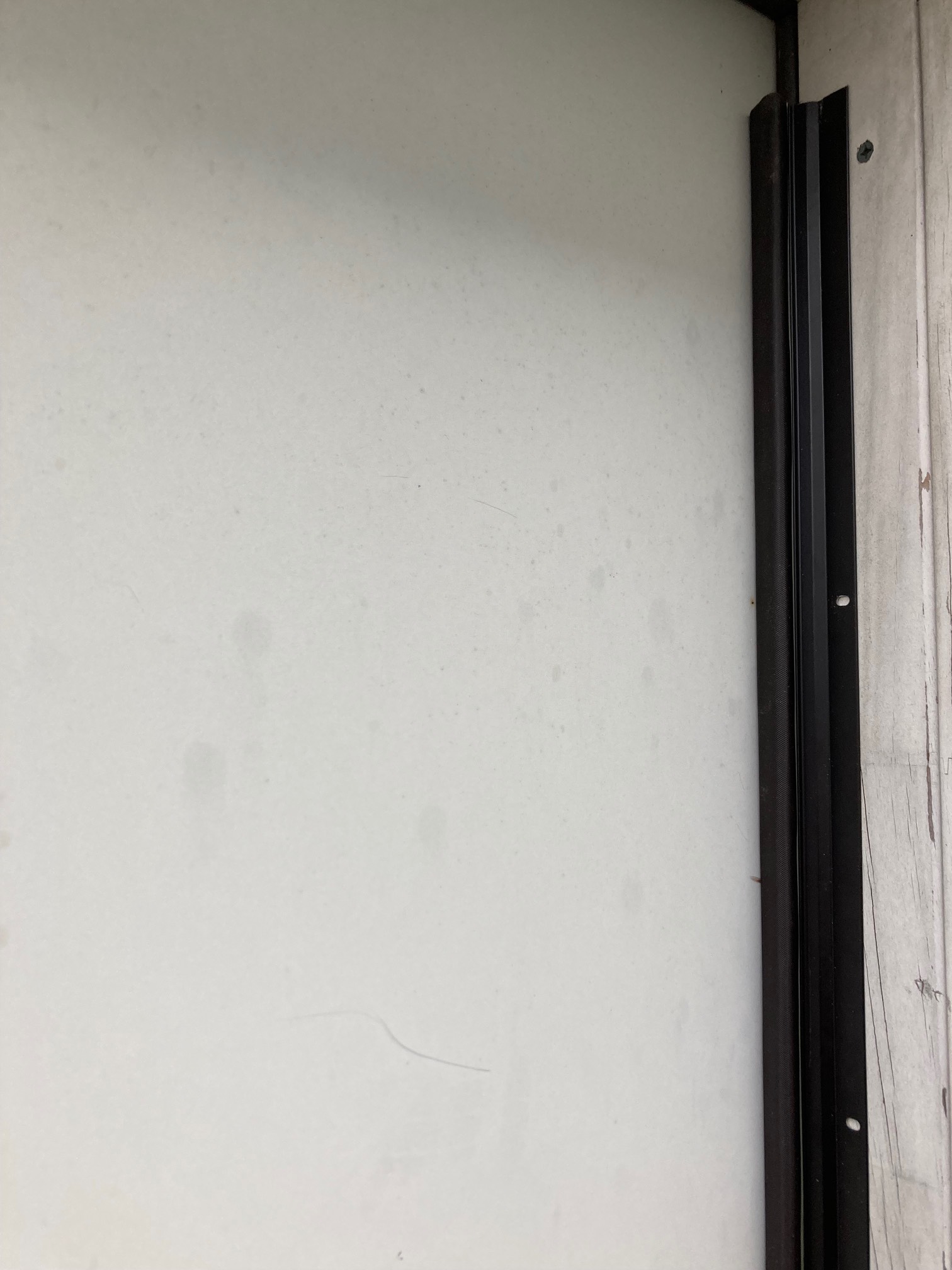 One strip of weatherstripping outside door