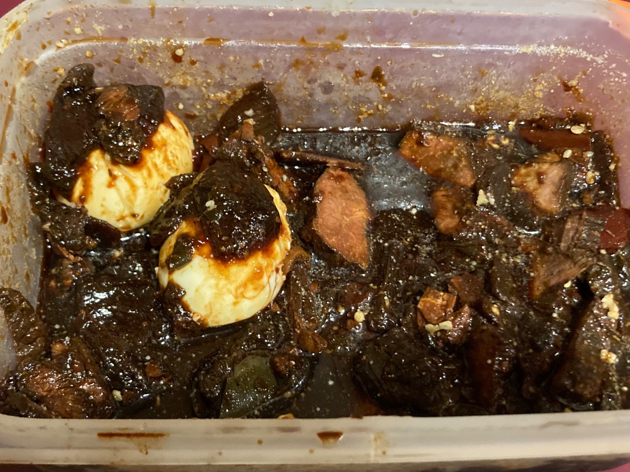 Boiled eggs in a container of 장조림.