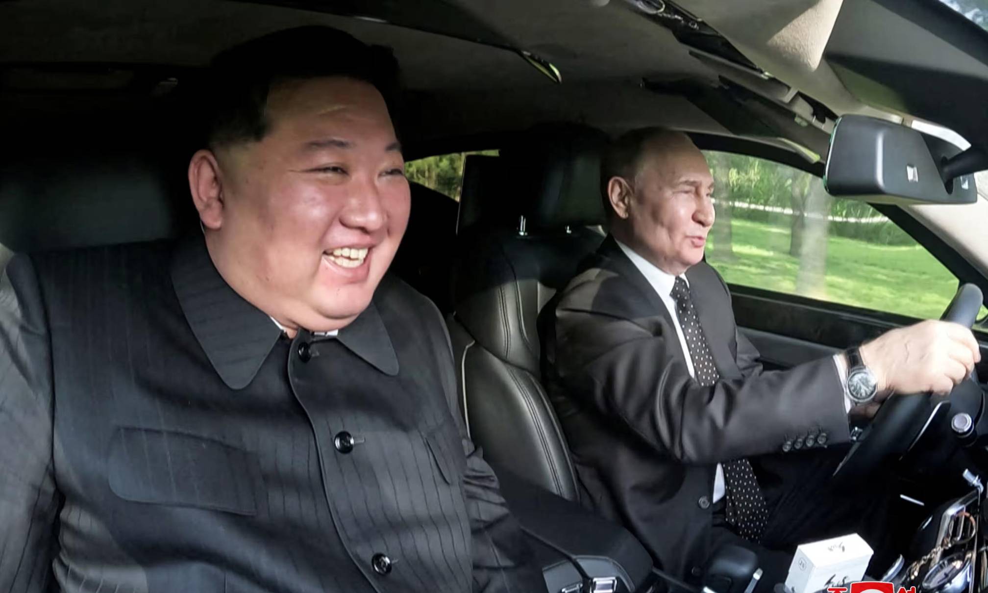 Kim Jong Un and Putin in a car