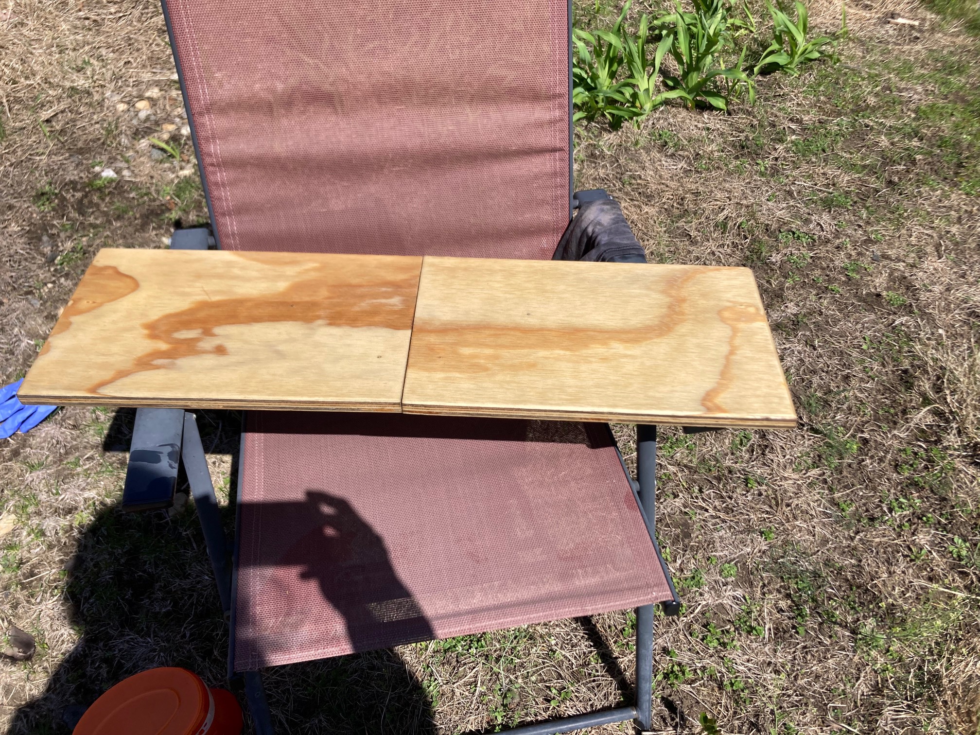 Darker plywood on lawn chair