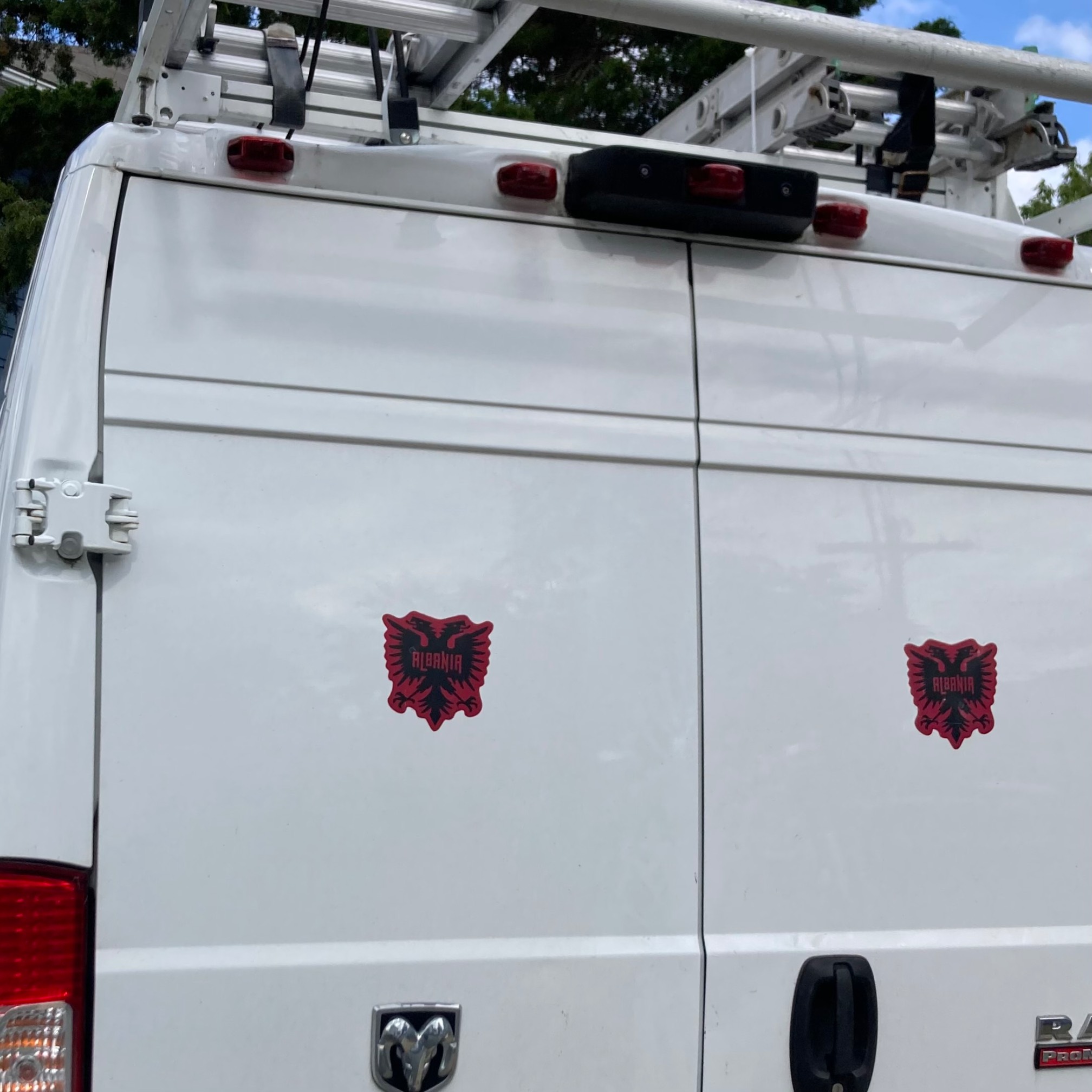 Van with two Albania stickers