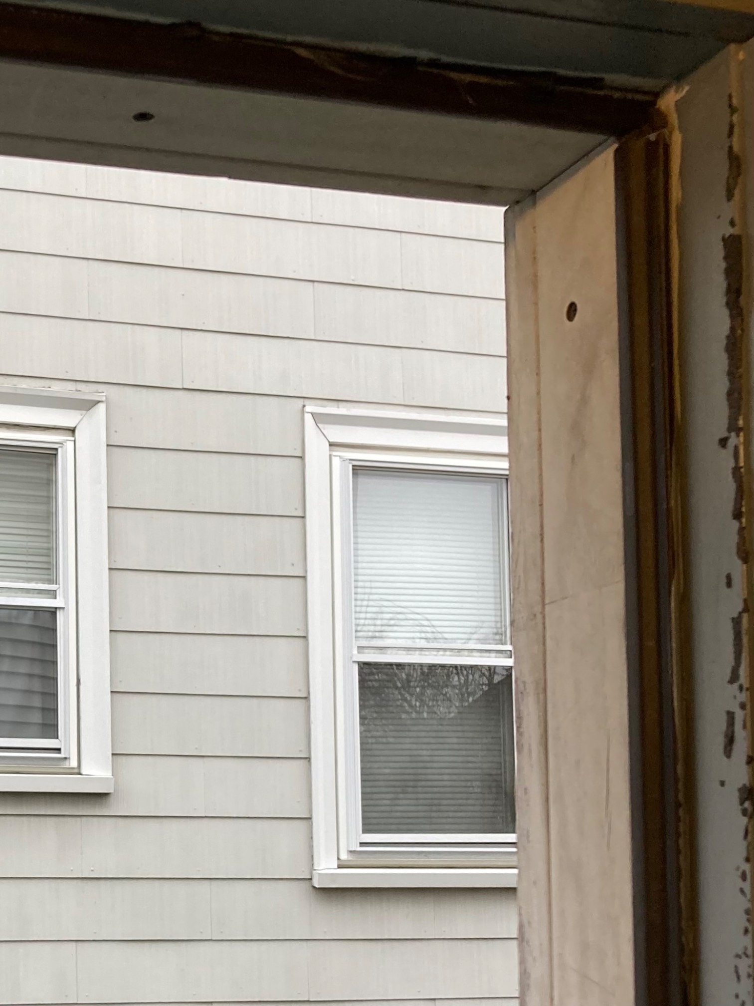 Doorway with interior weatherstripping