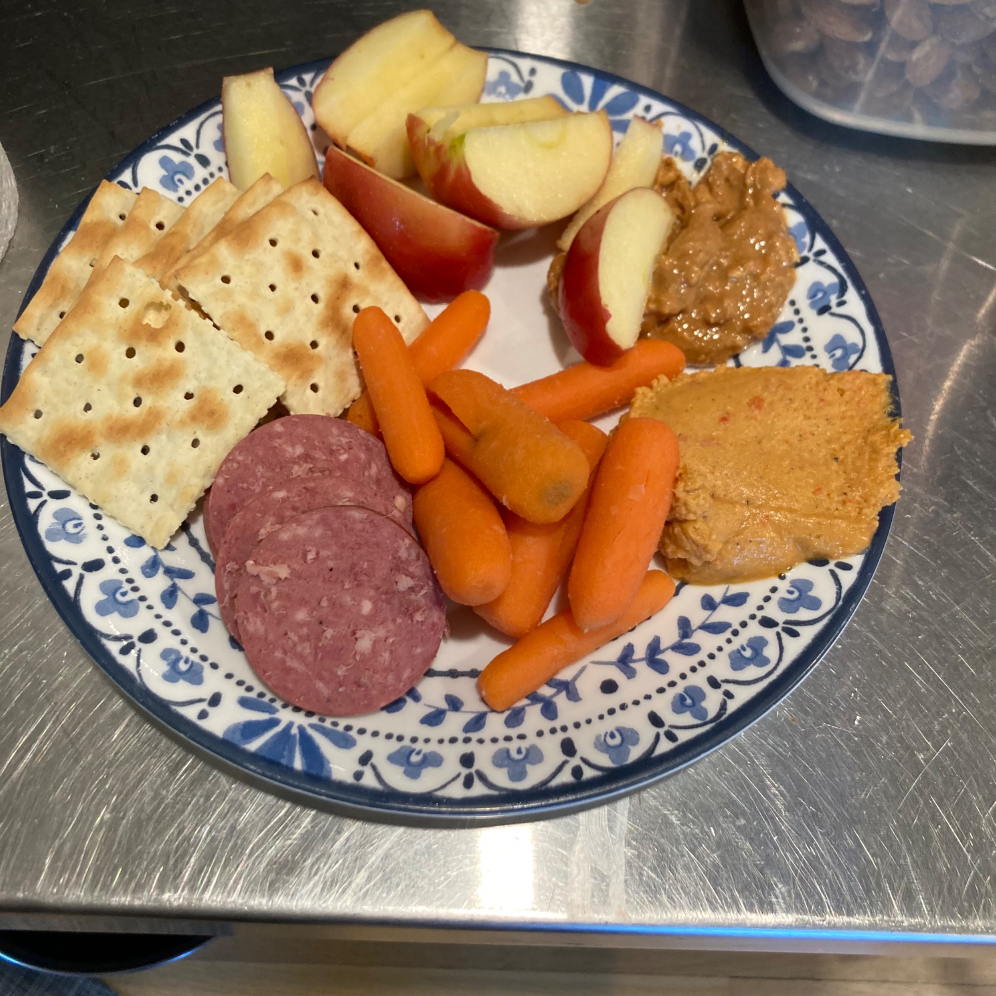 Crackers, apples, carrots, sausage