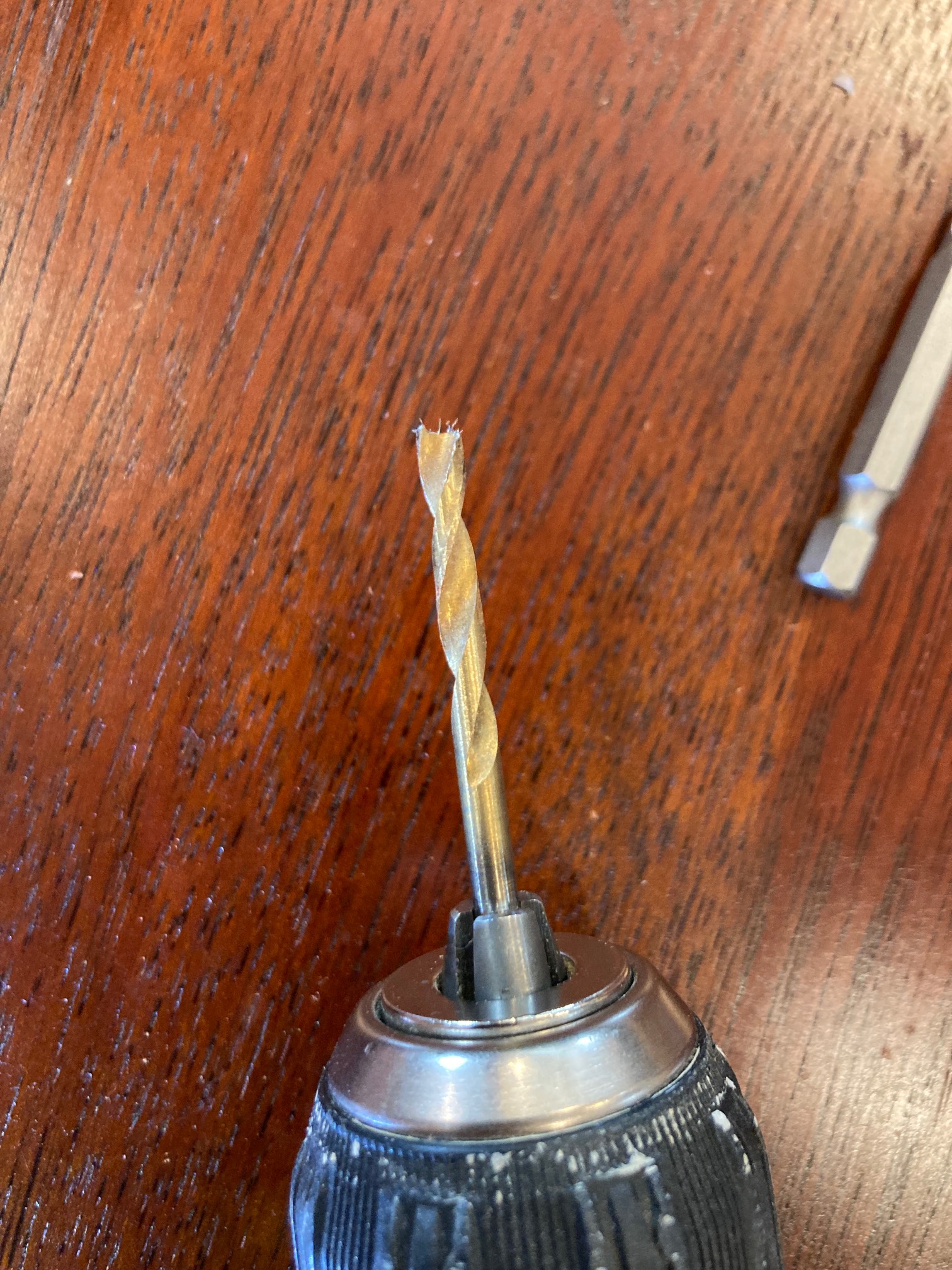 Dag. Snapped a carbide steel bit. Maybe there’s a metal plate in here?