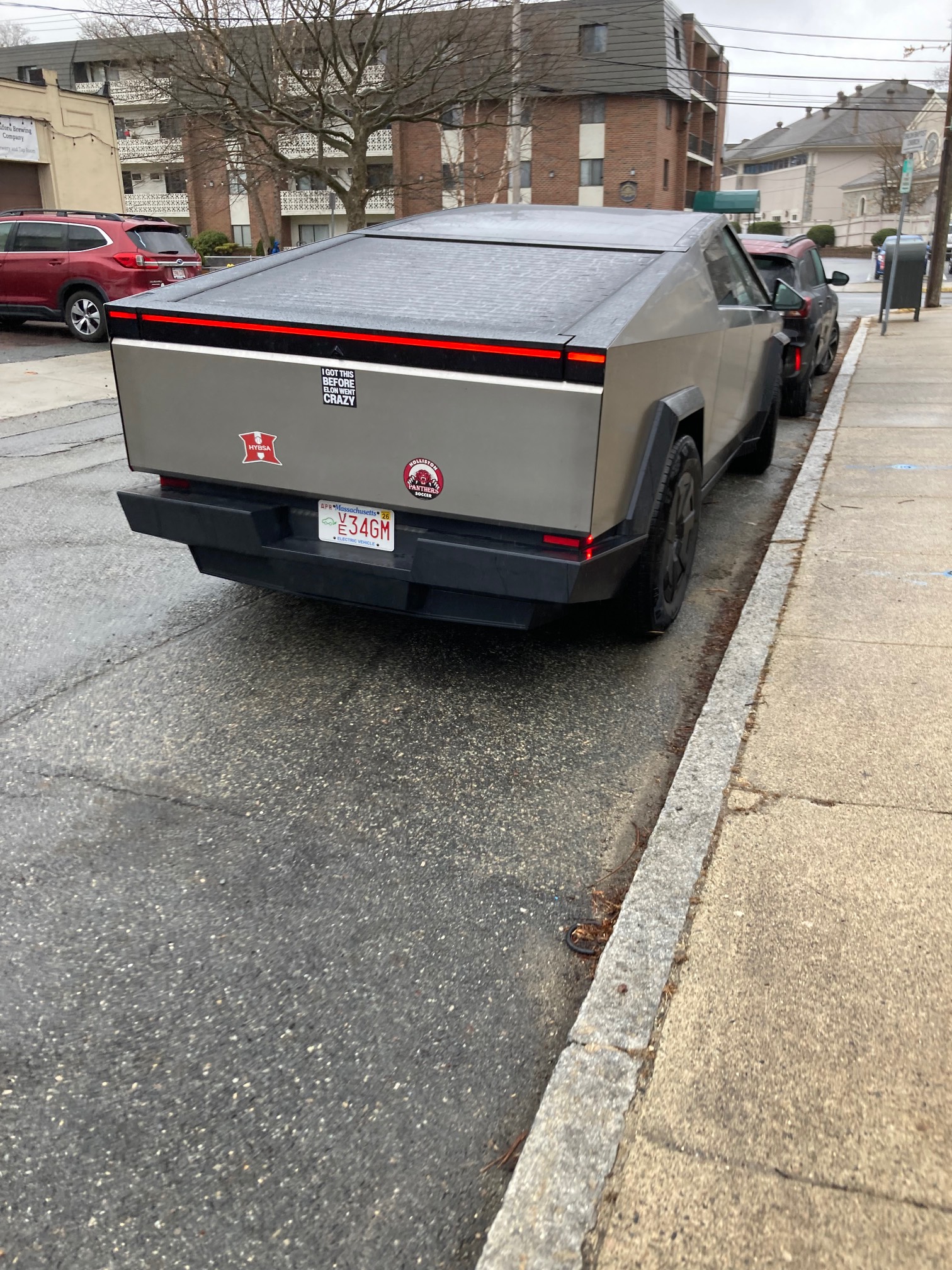 Cybertruck with bumper sticker disavowing Elon