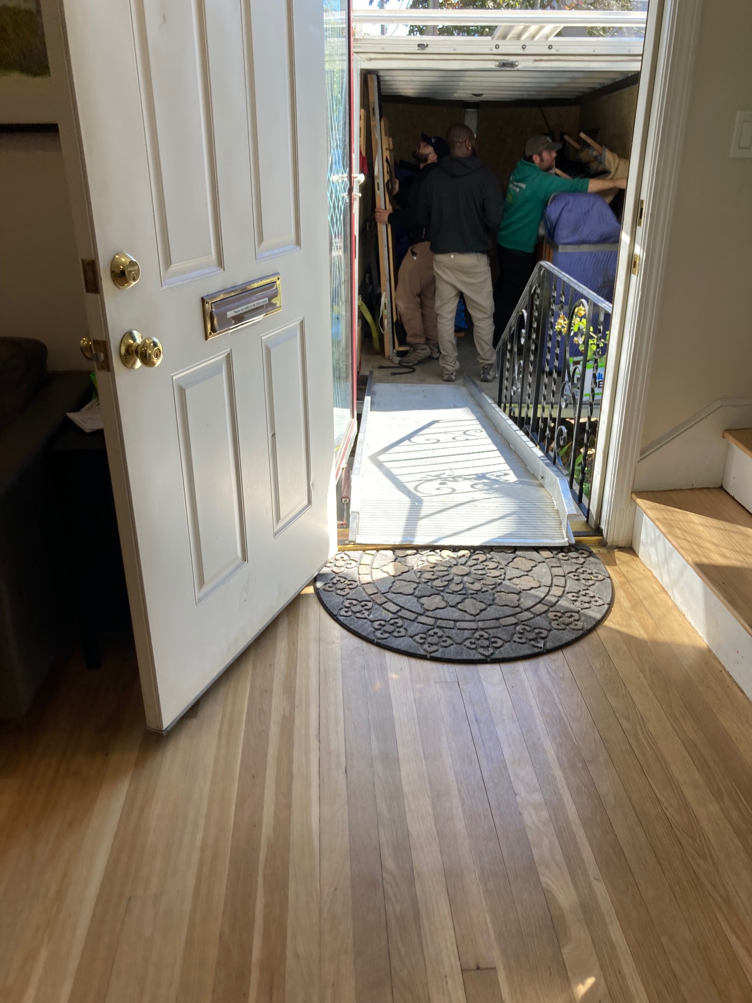 Metal bridge from truck to house