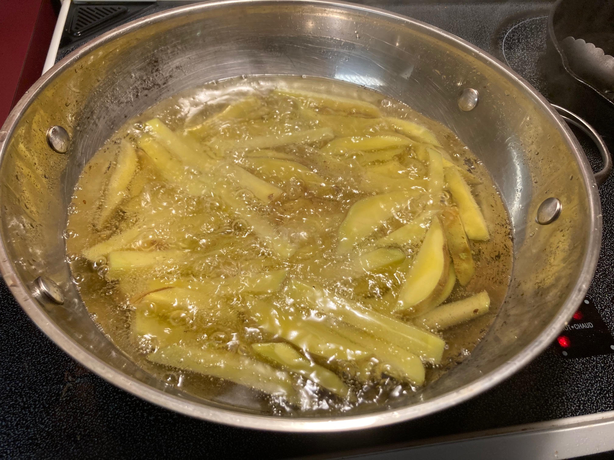 Trying the Kenji Alt-Lopez wok deep frying method. Things really do get up to temp way more quickly.