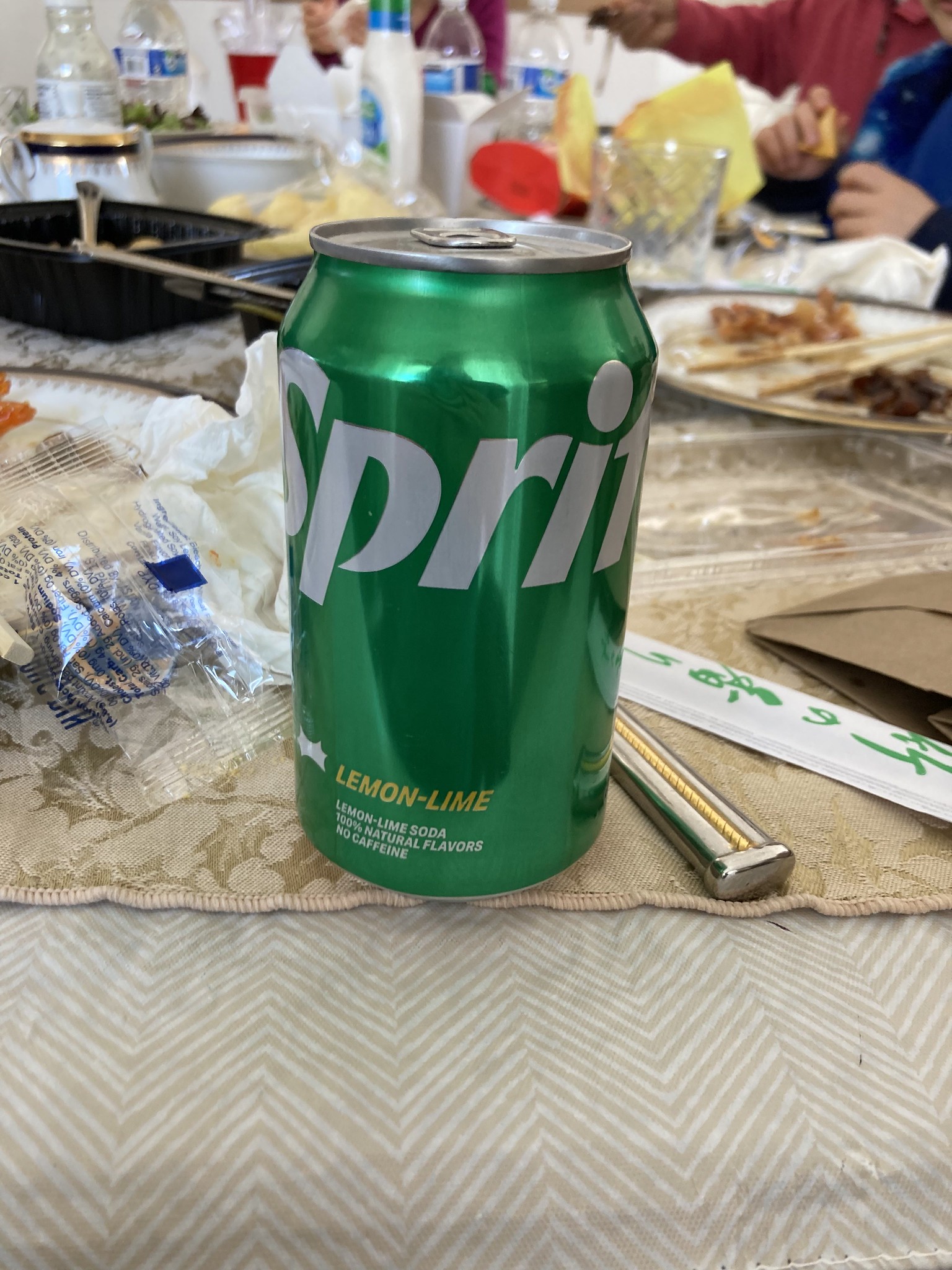 Can of Sprite on table