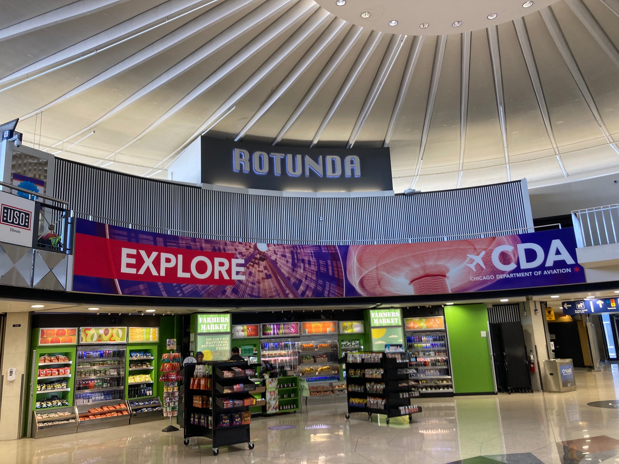 Airport interior with banner that says Rotunda in Chicago font