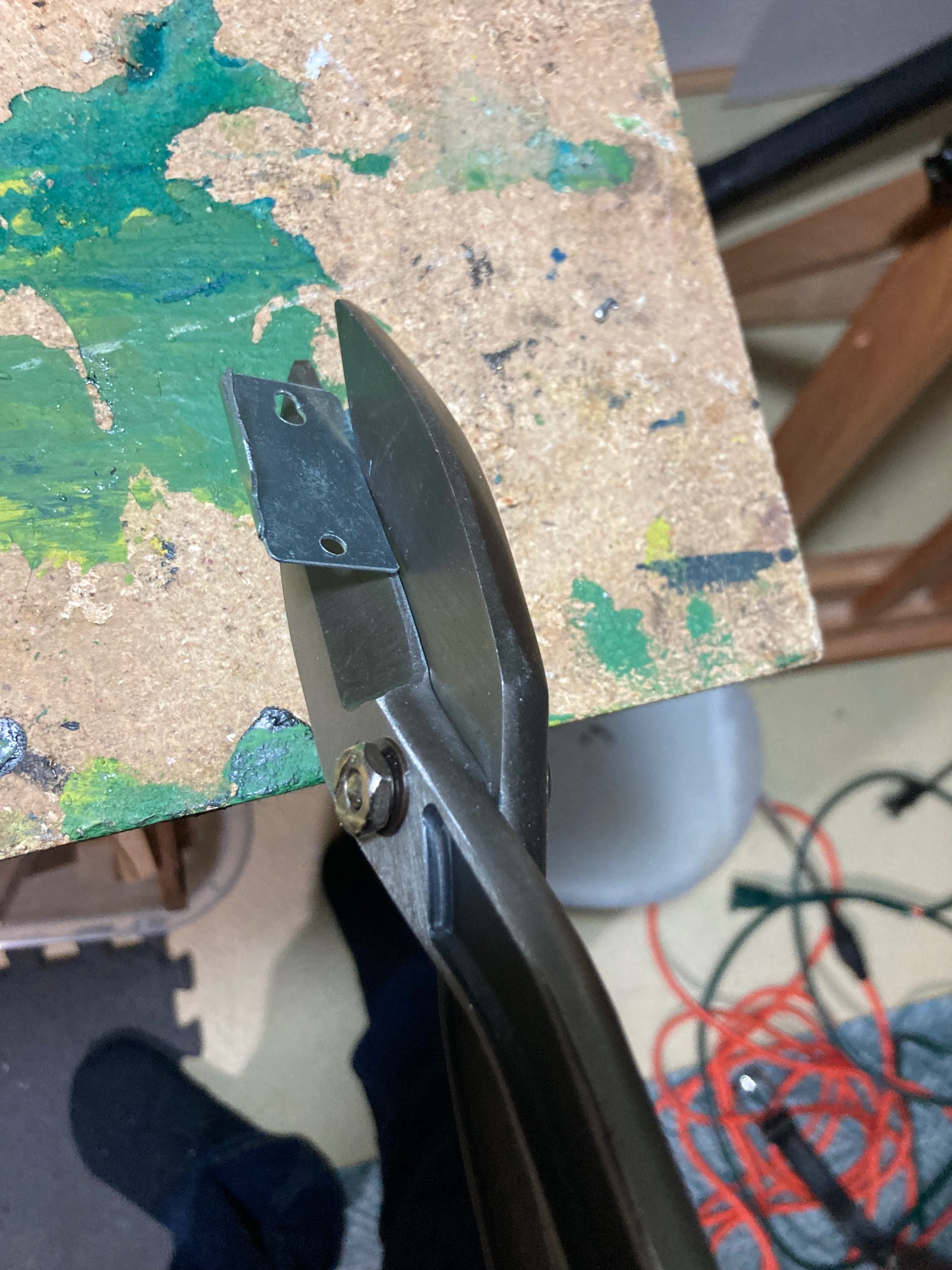 Tin snips can cut curtain brackets!