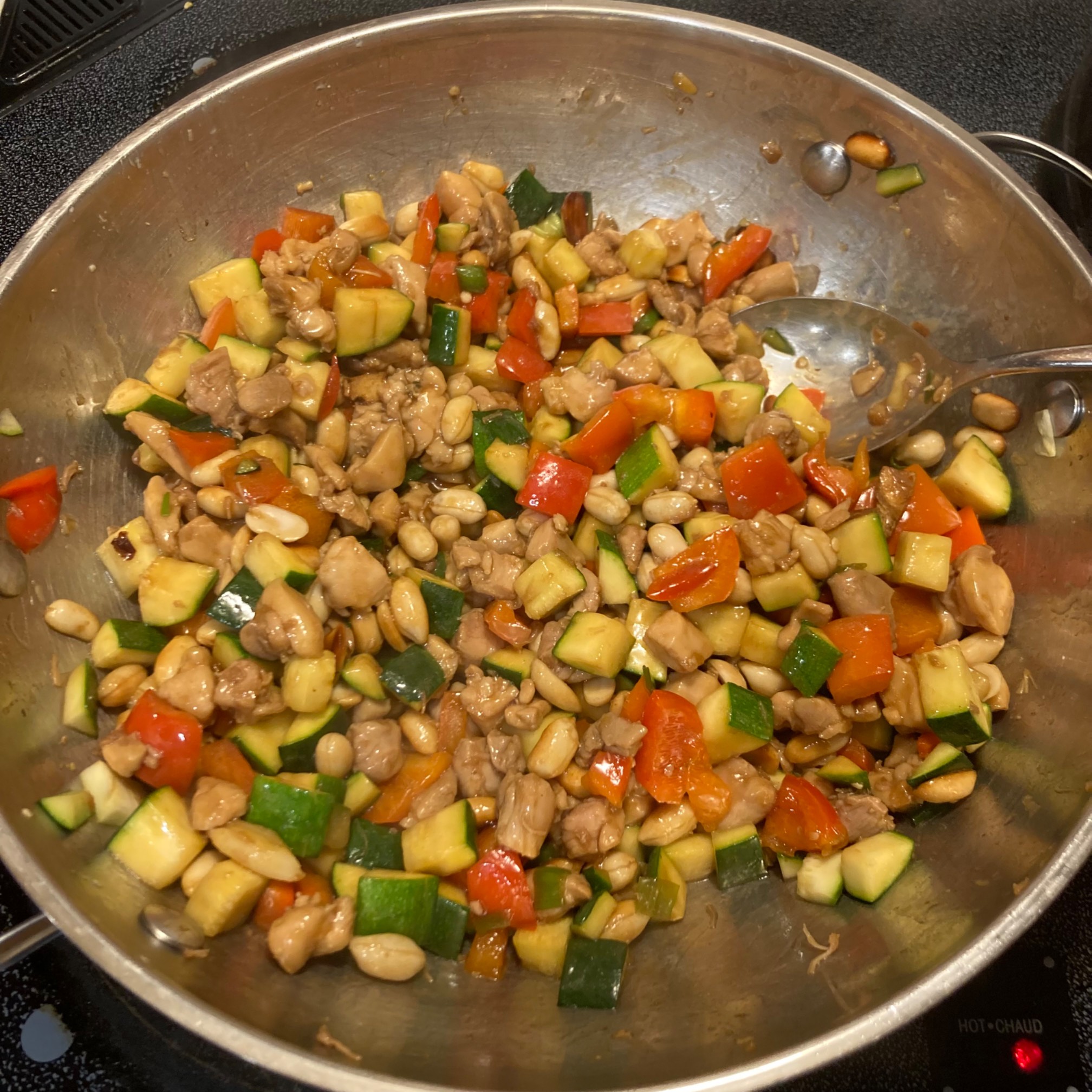 Kung pao with peanuts in a wok