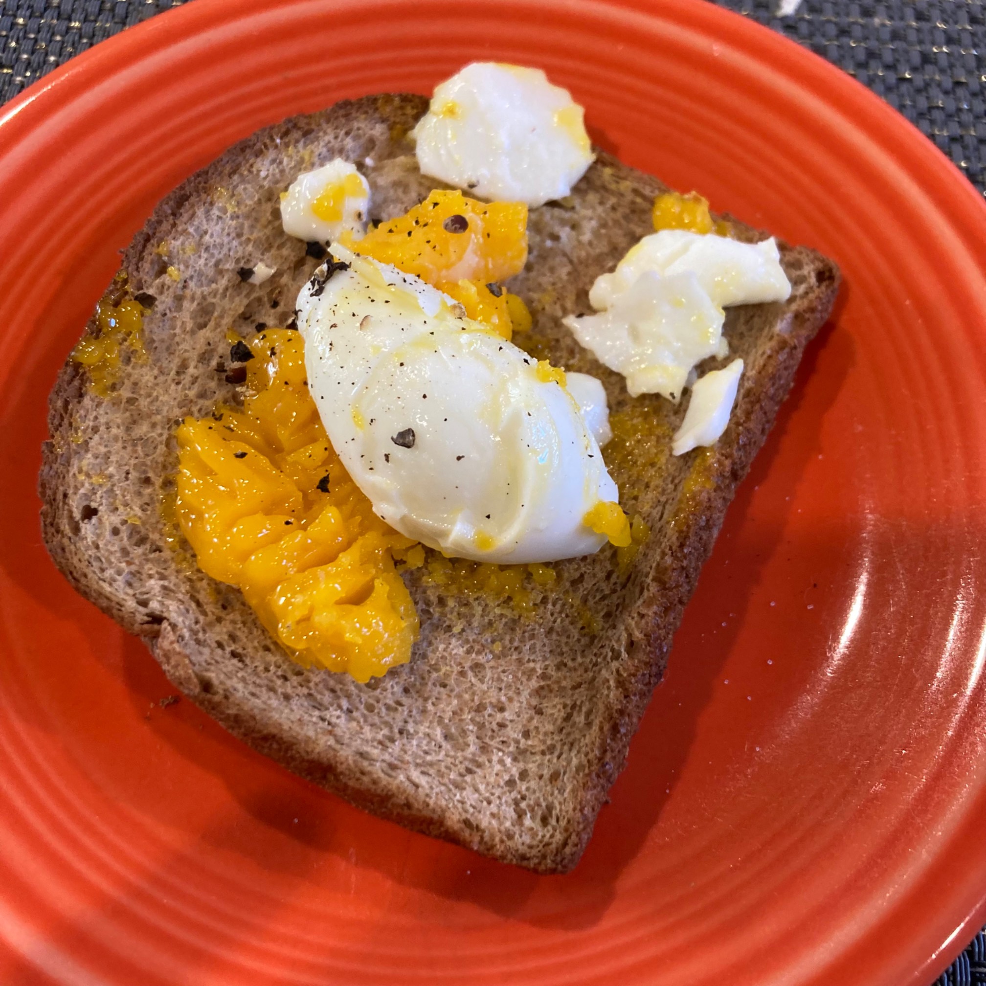 Soft-boiled egg on toast is excellent, despite looking like an accident