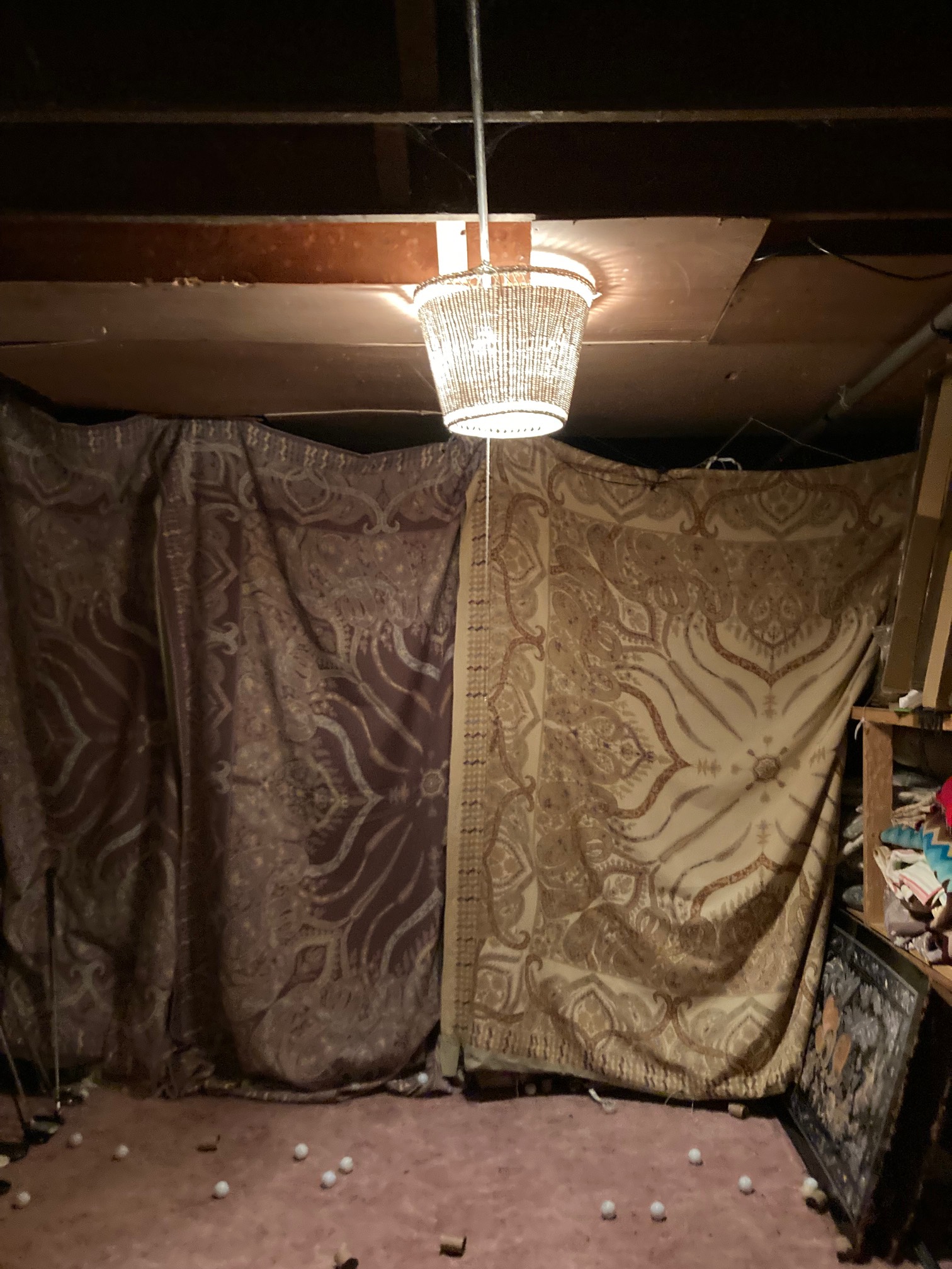 Upside down lampshade on basement ceiling