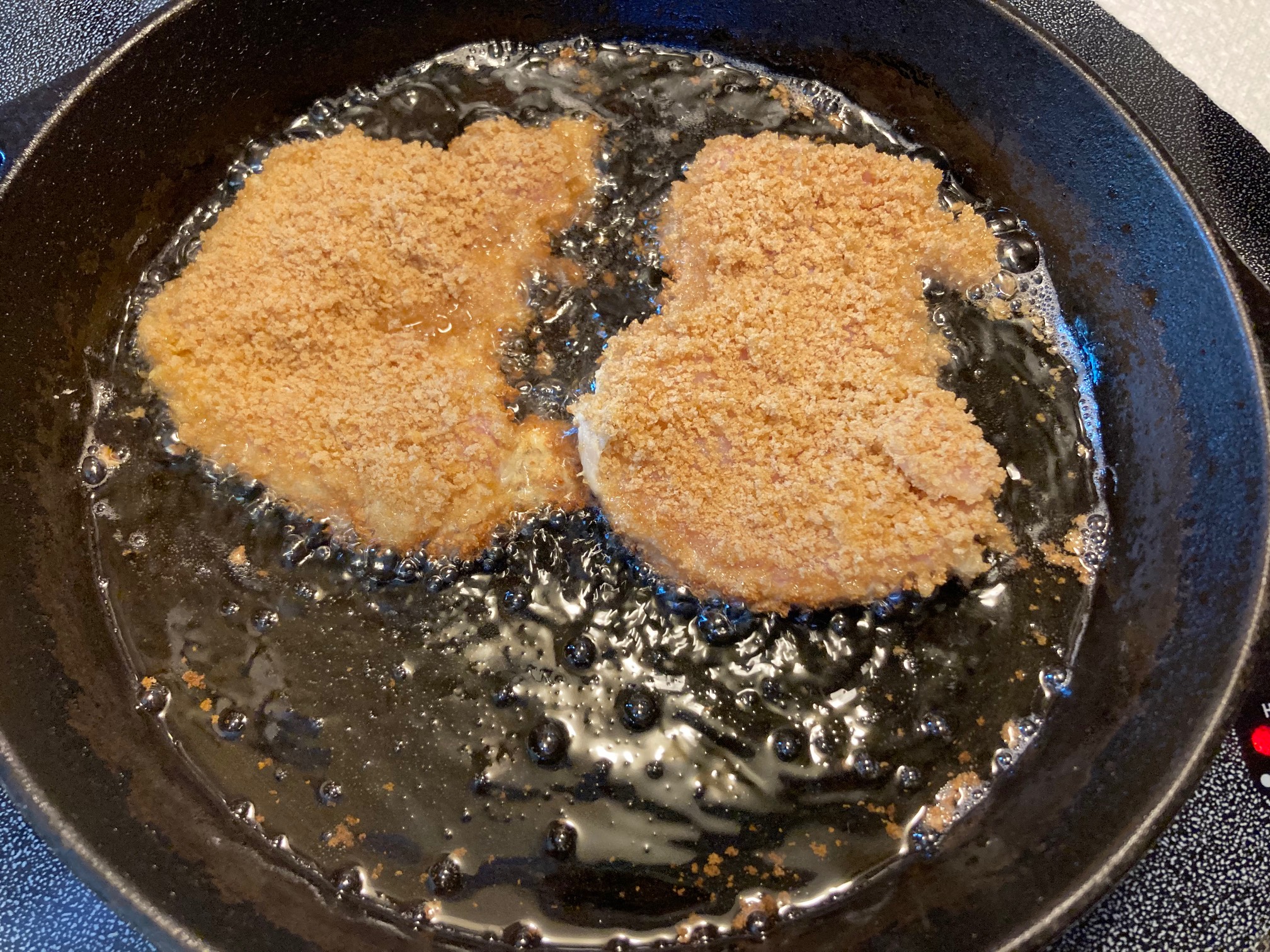 I’ve found deep frying breaded stuff to be too messy, so I’m trying semi-deep frying.