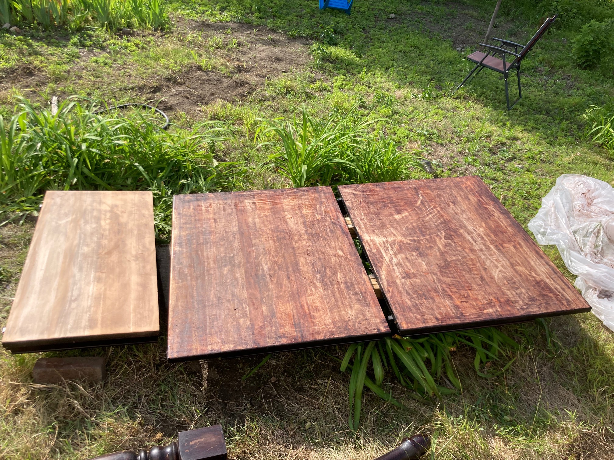 I thought it might be easy to get the glossy black finish off of our dining table, which I never liked, but even after multiple applications of paint stripper, the underlayers would not come off without really laborious scraping. So, I ended up sanding it off, which I could have done in the first place.