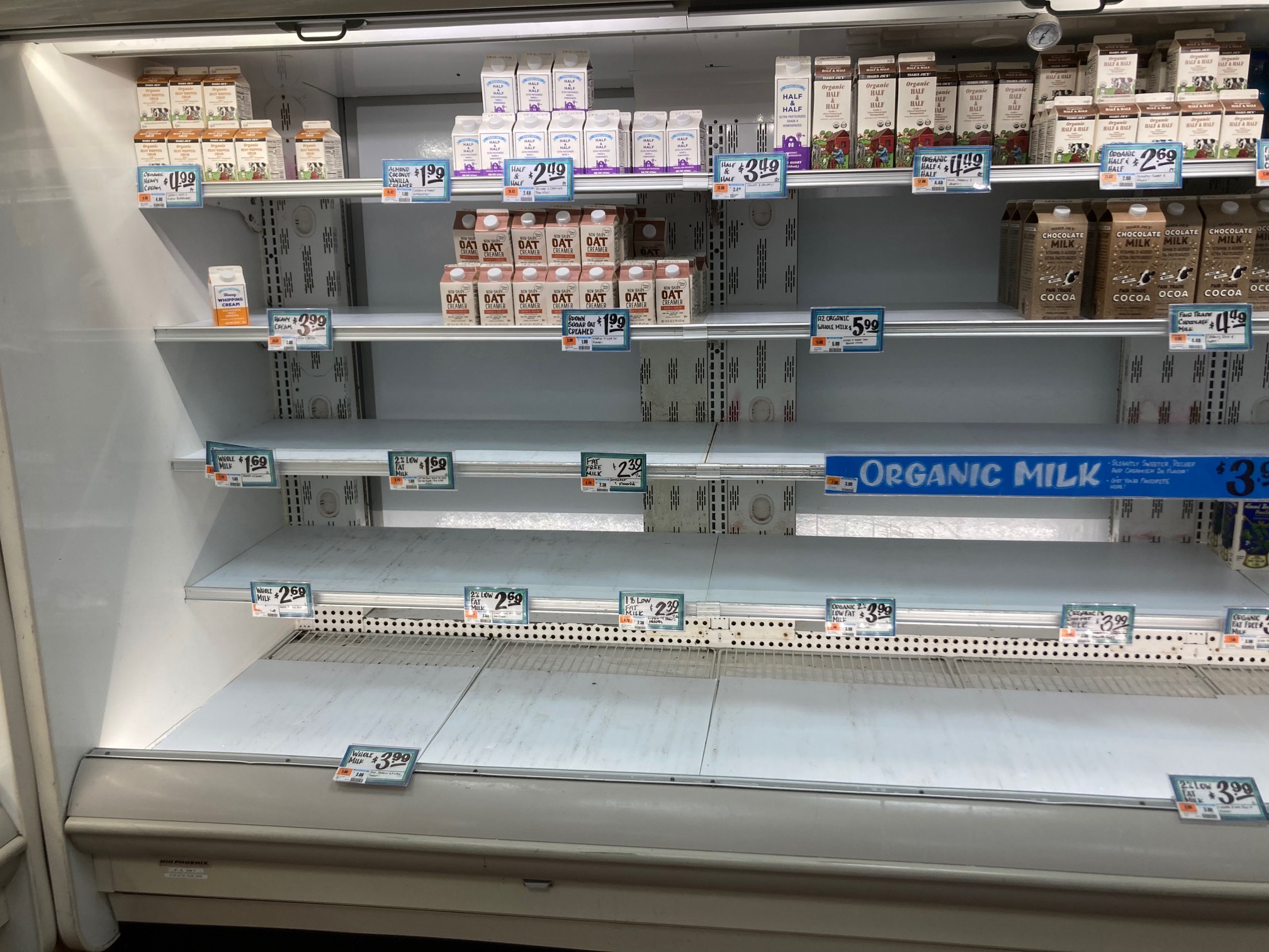 Empty milk shelves