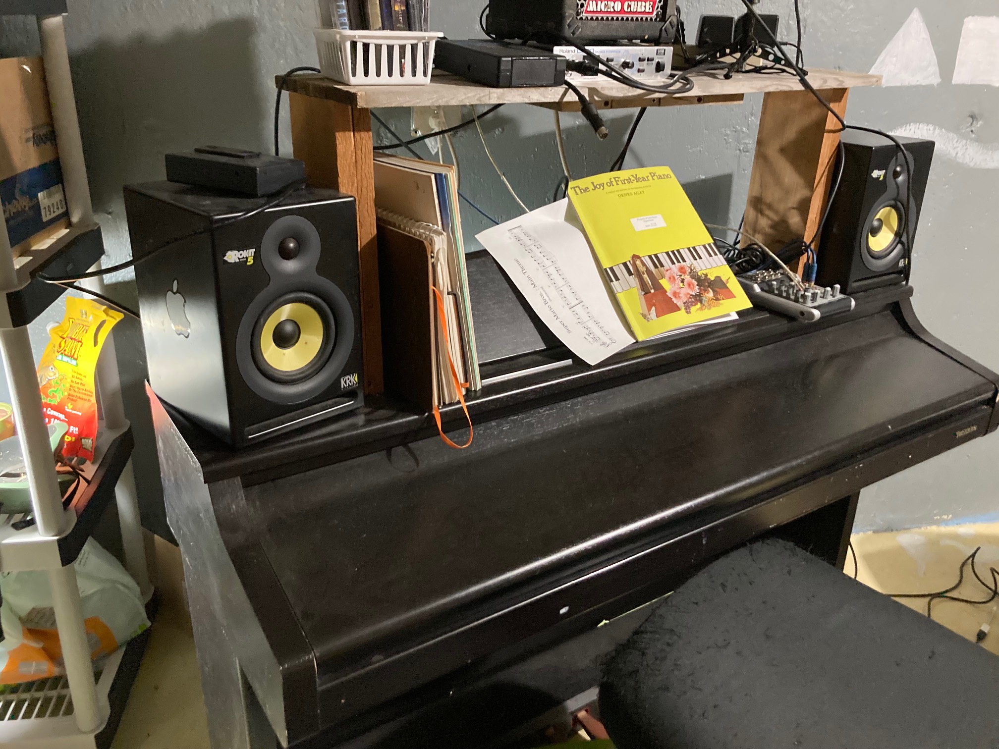 I built storage on top of the piano, but it turns out if I want to change a speaker, I have to take 