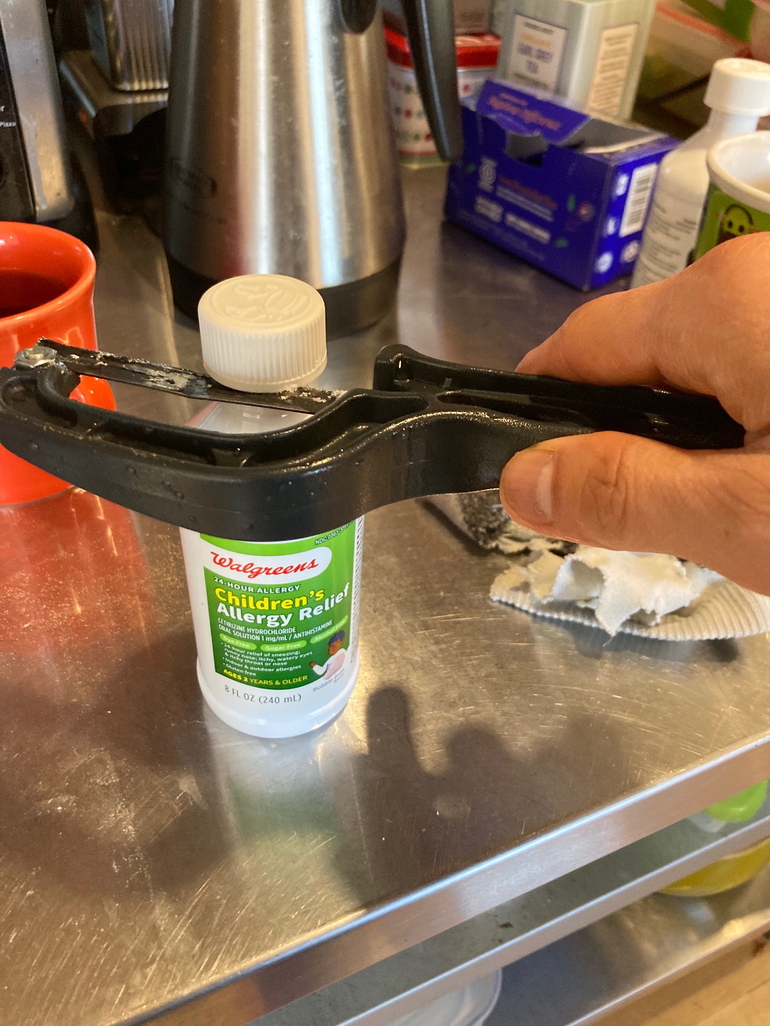 Hacksaw on plastic bottle