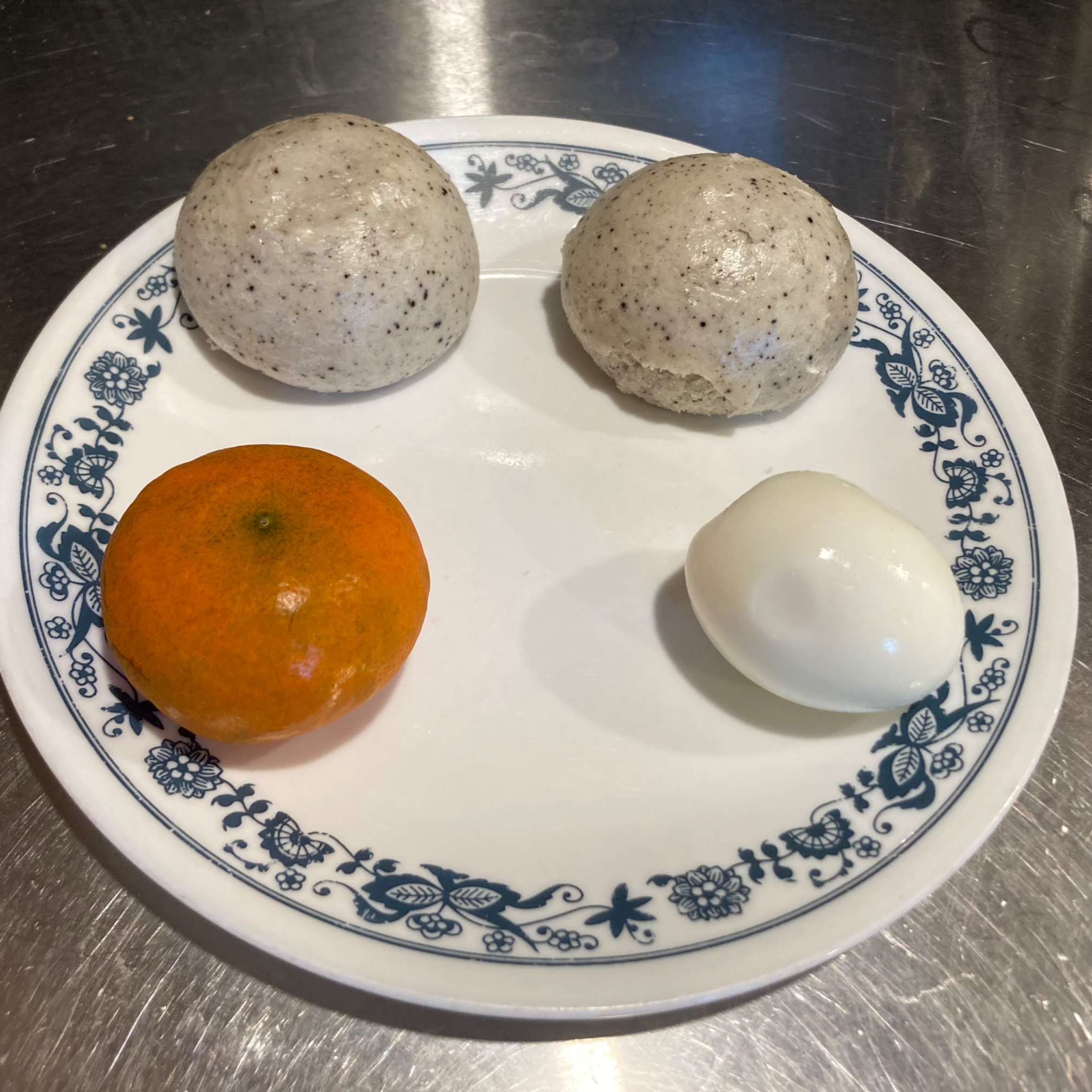 Egg, tangerine, two steamed buns