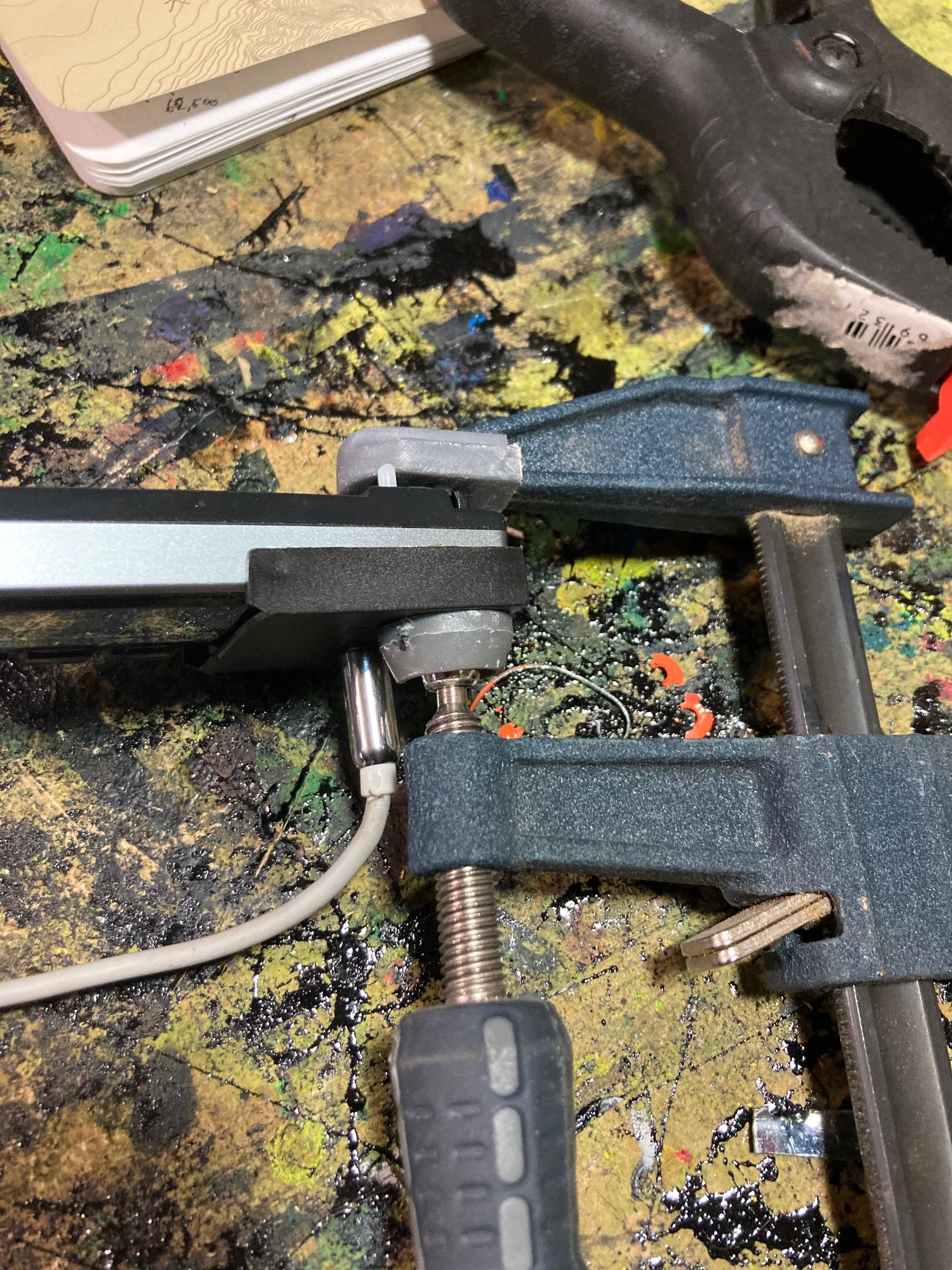 Clamp pressing plastic plane and car stereo face together