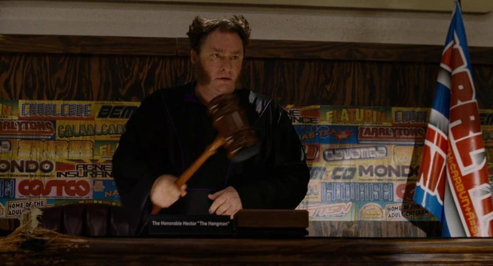 The judge from Idiocracy with an oversize gavel