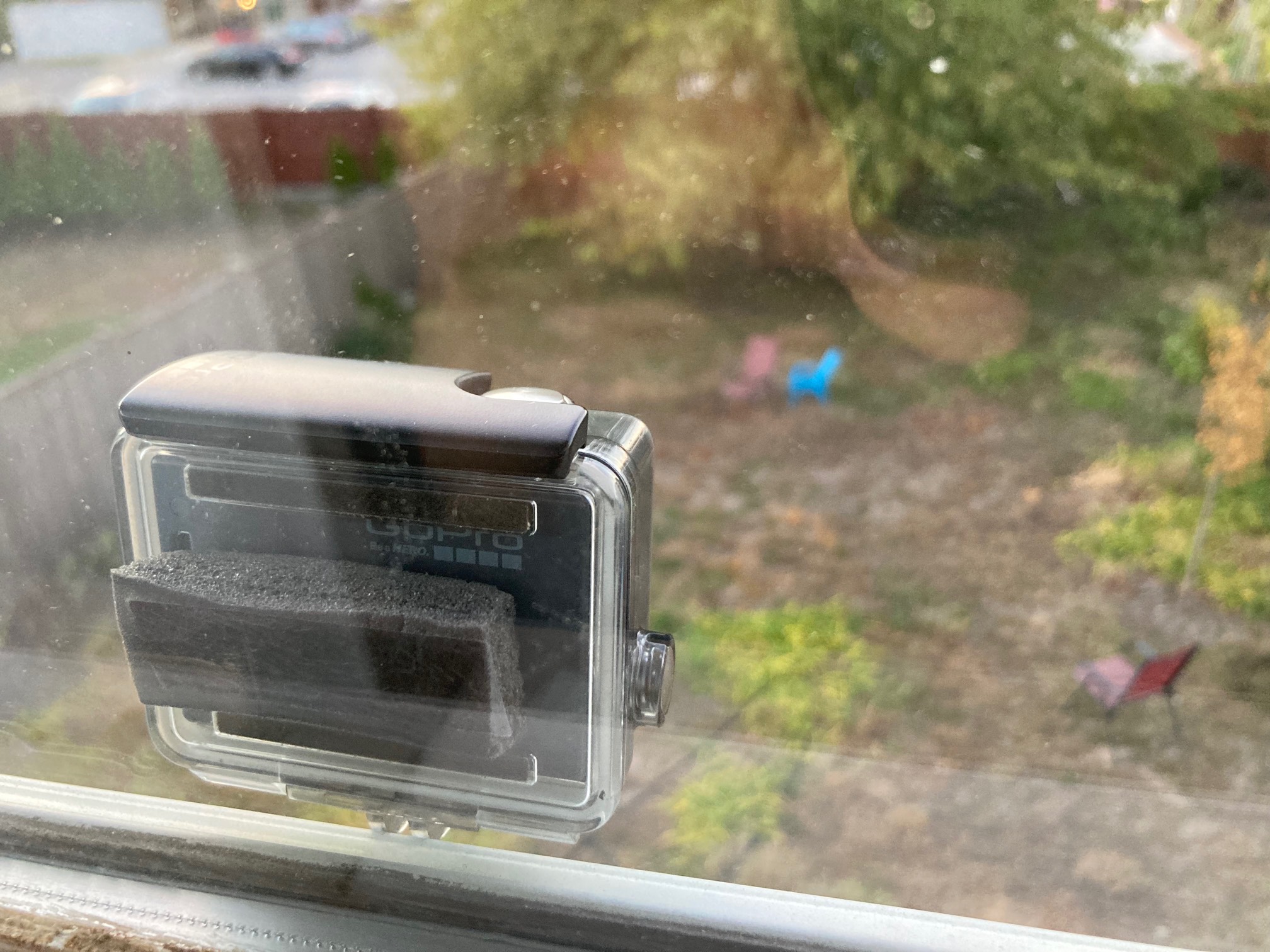 GoPro on window facing backyard