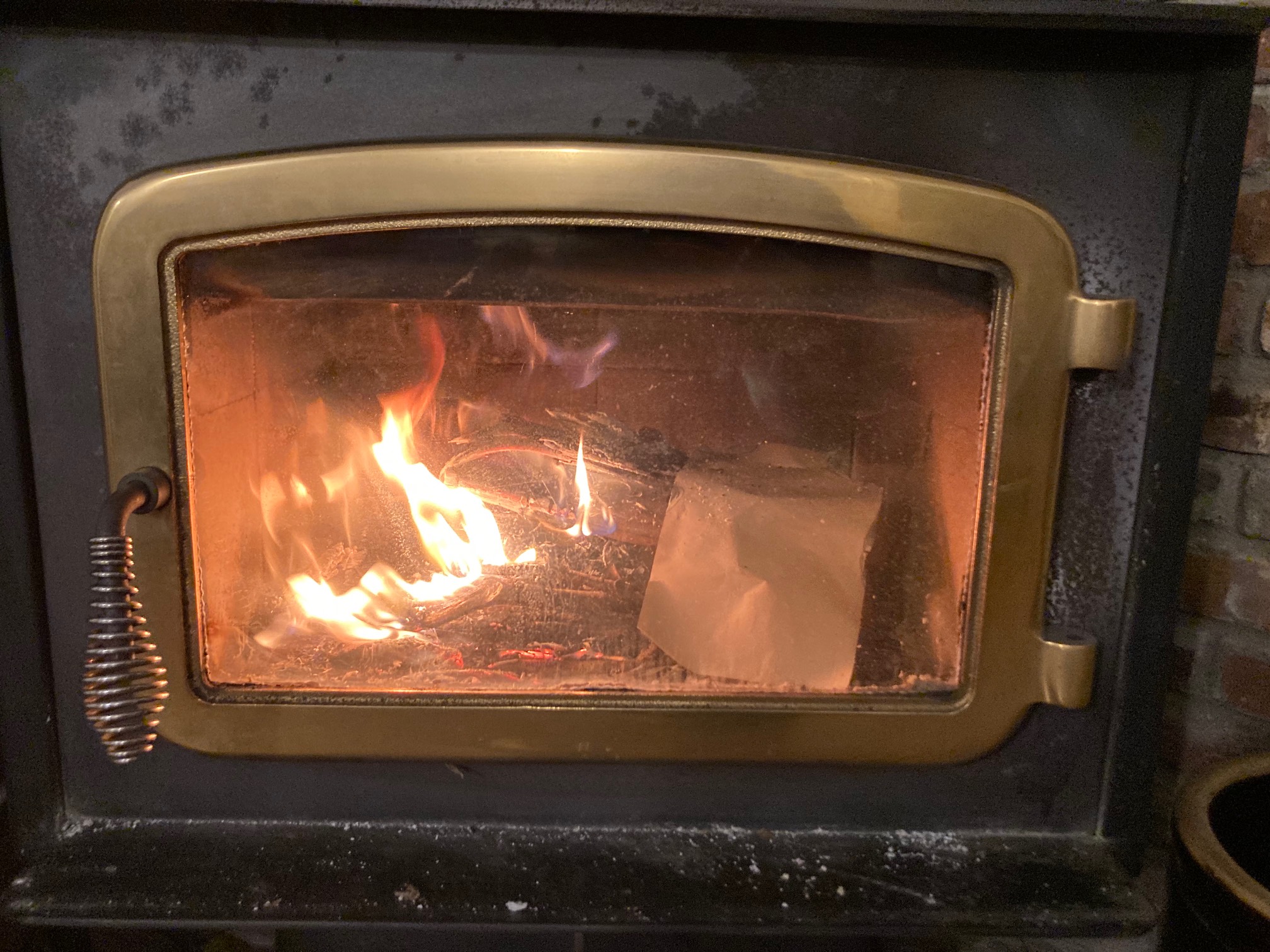 Fire report: It moved to the front! Firewood label still mostly untouched, though.