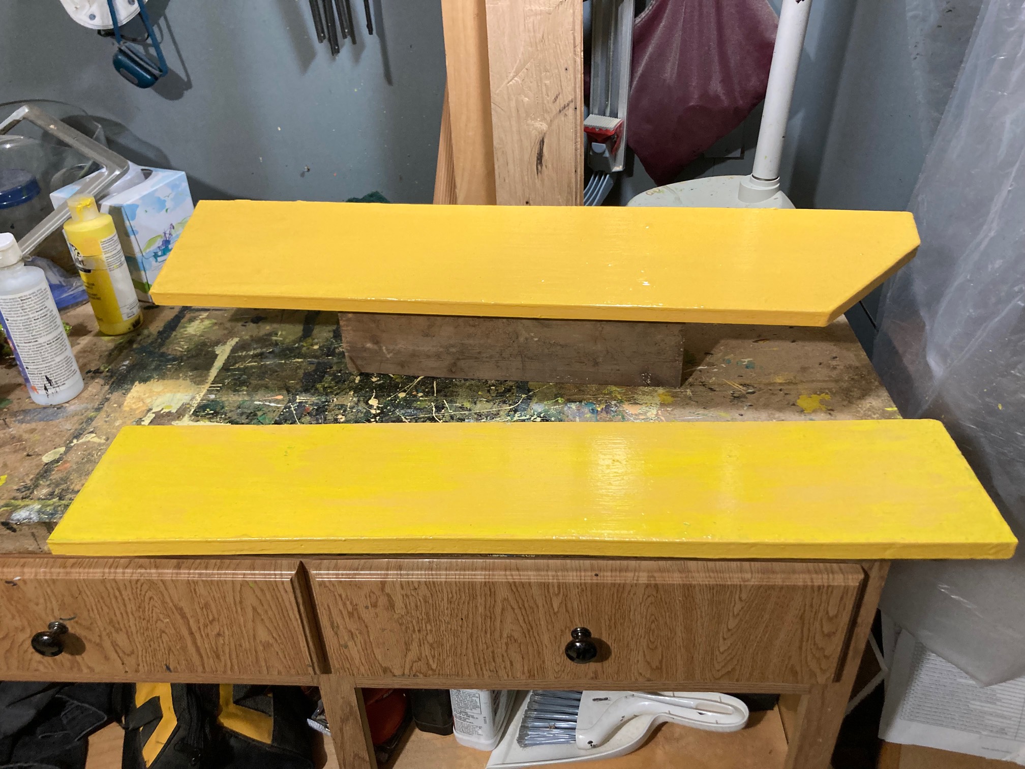 Yellow shelves on workbench