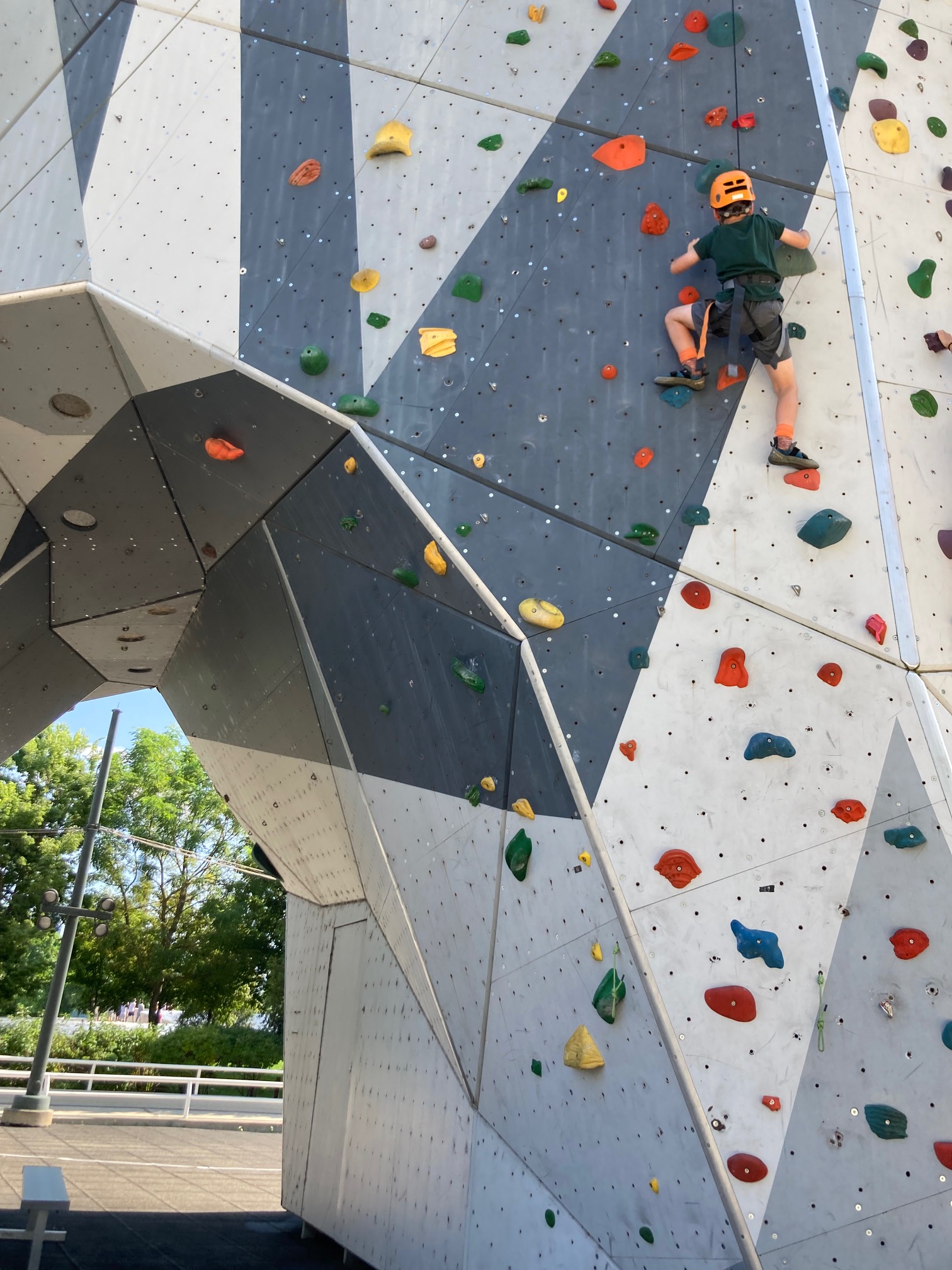 Kid climbing wall with handholds