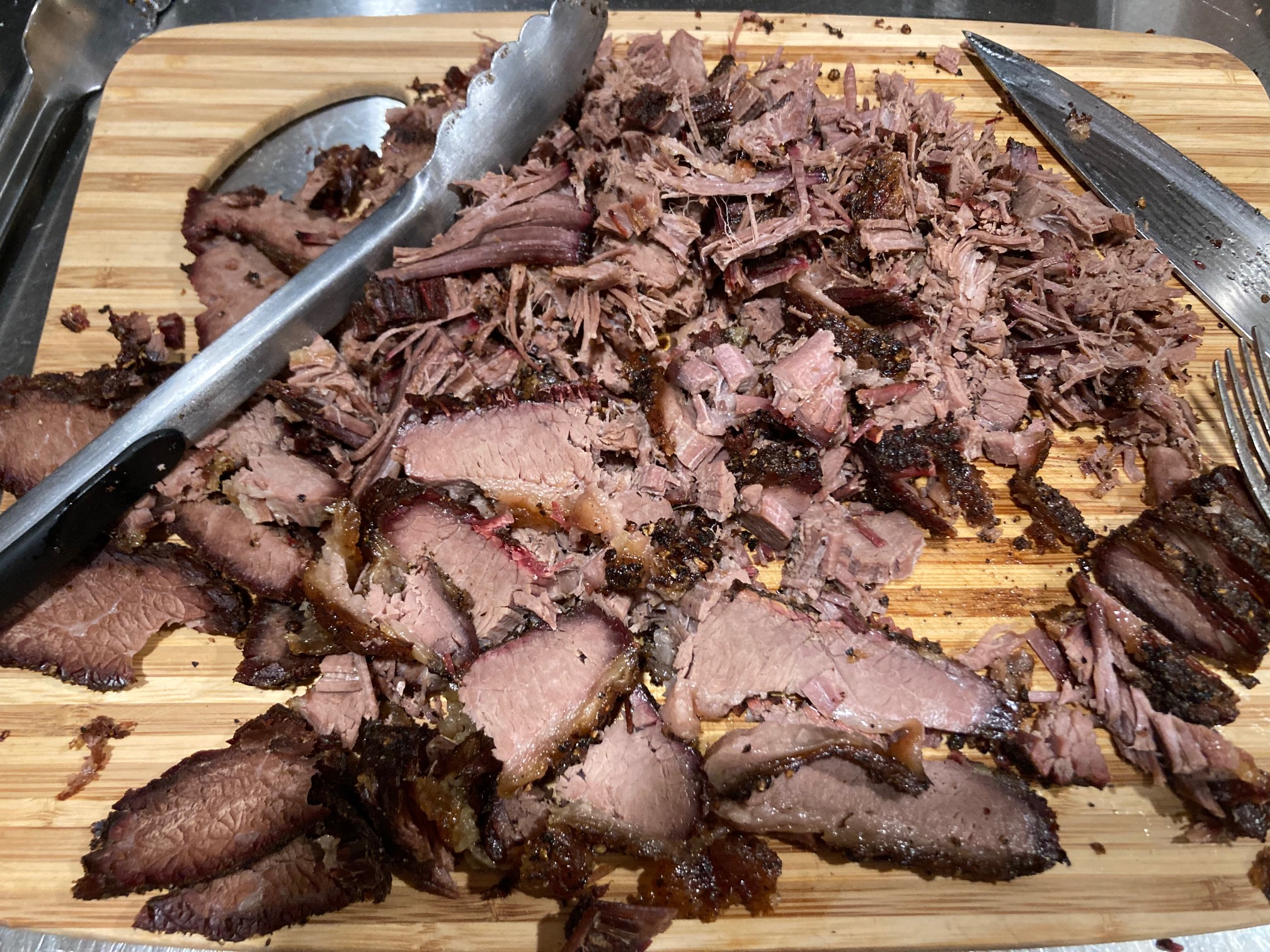 Sliced brisket on a cutting board