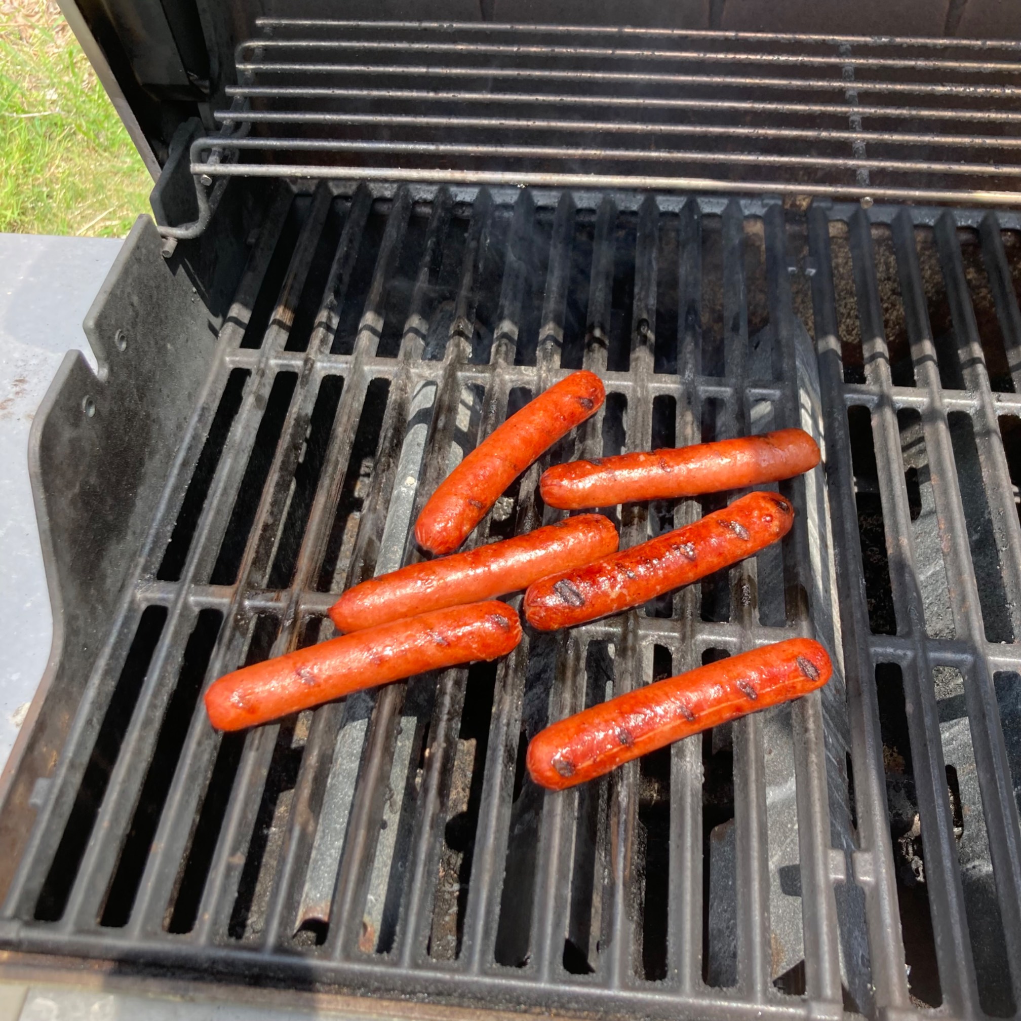 Hot dogs on grill