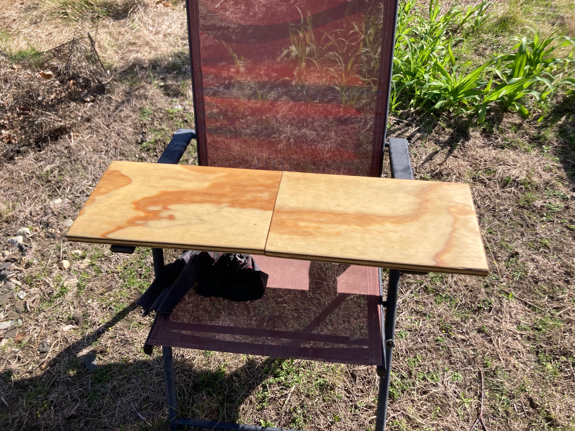 Darker plywood on lawn chair