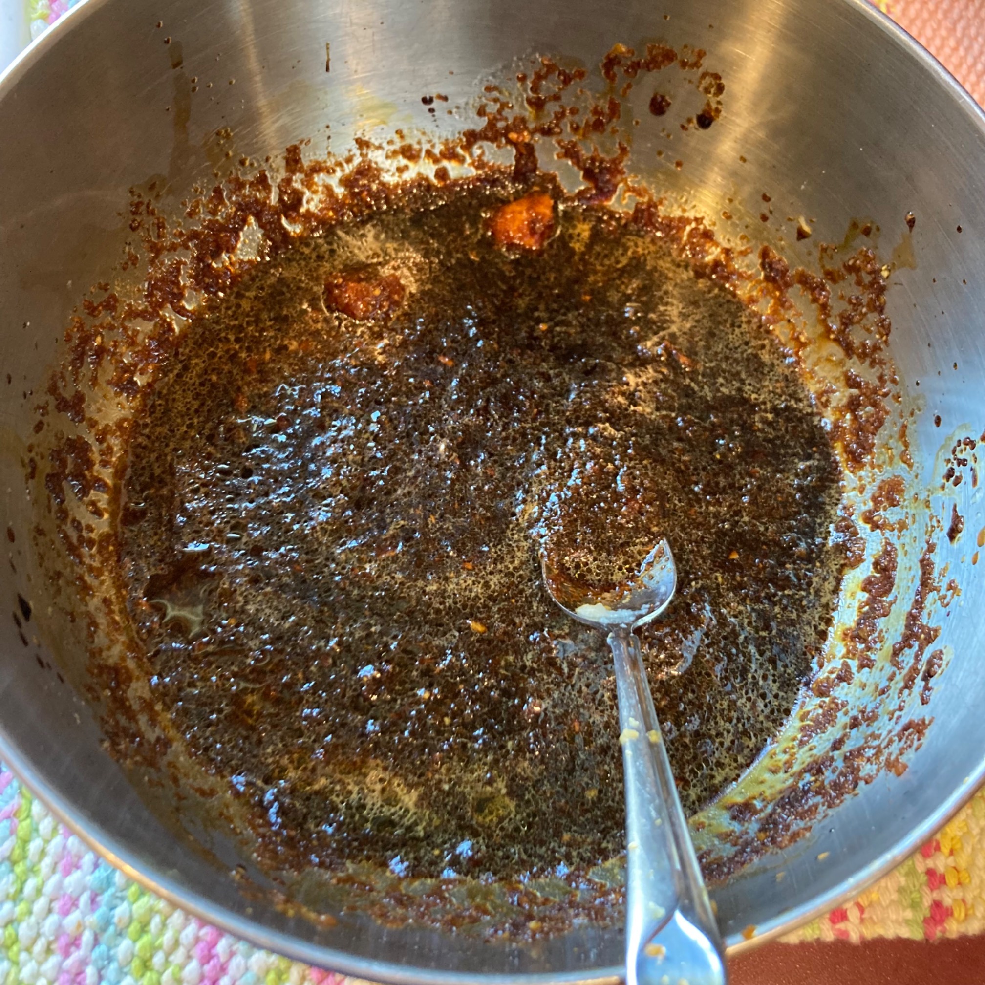 Bowl of brown liquid