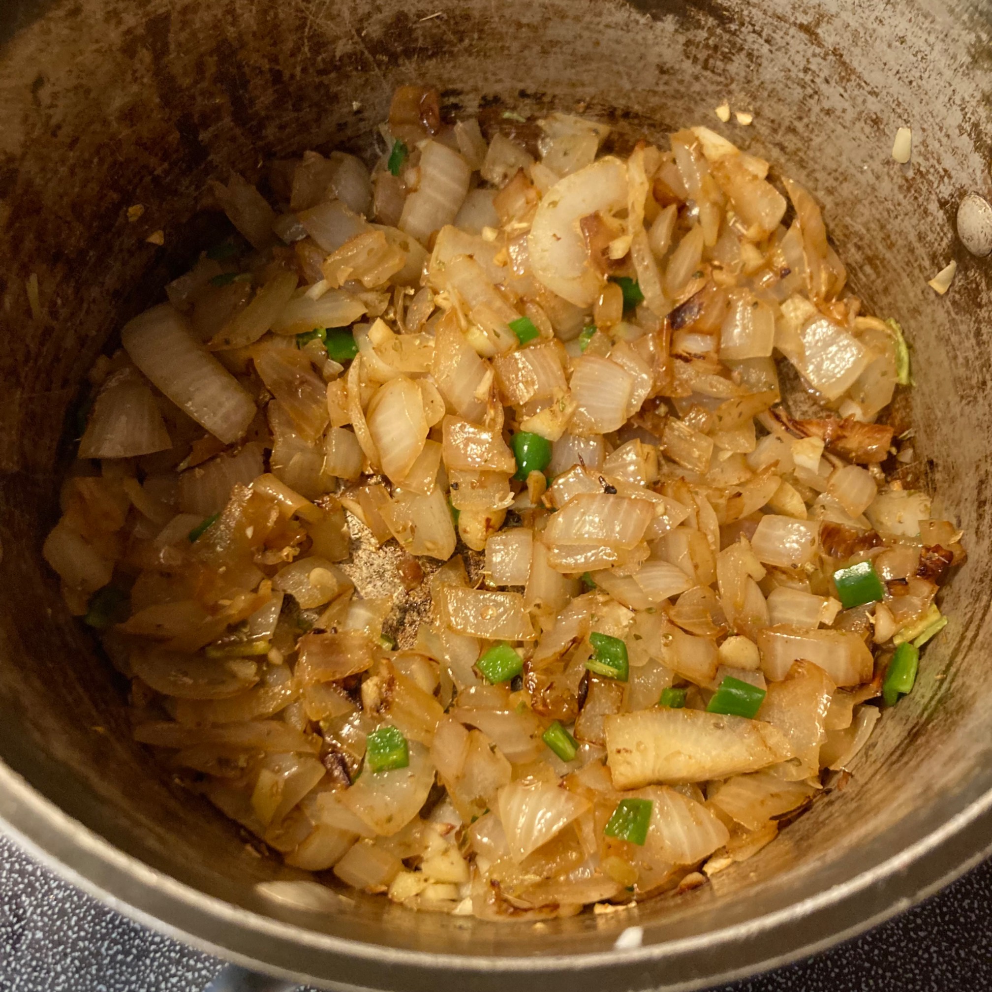 Onions with peppers in a pot