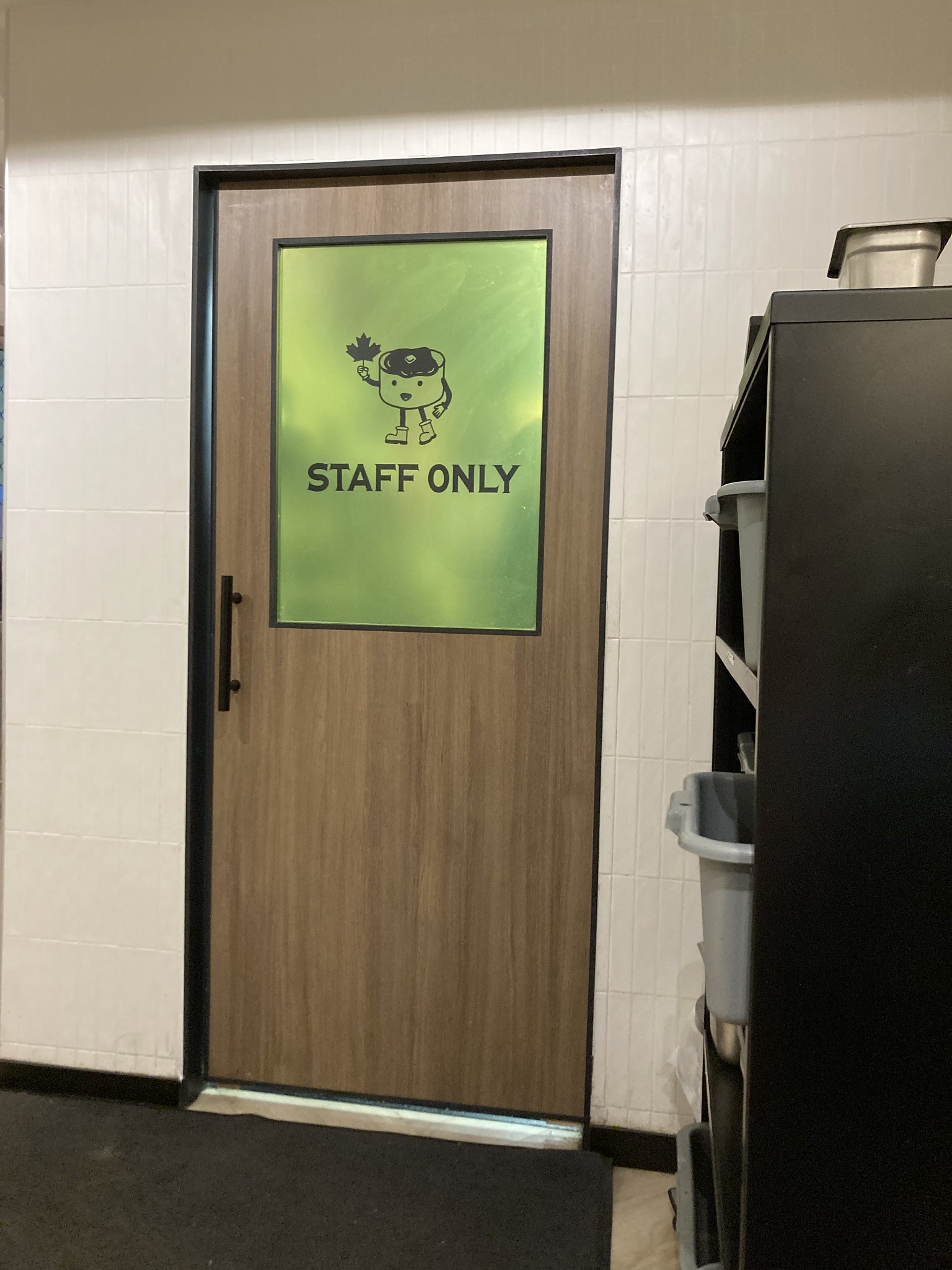Staff only door with puffy pancake mascot