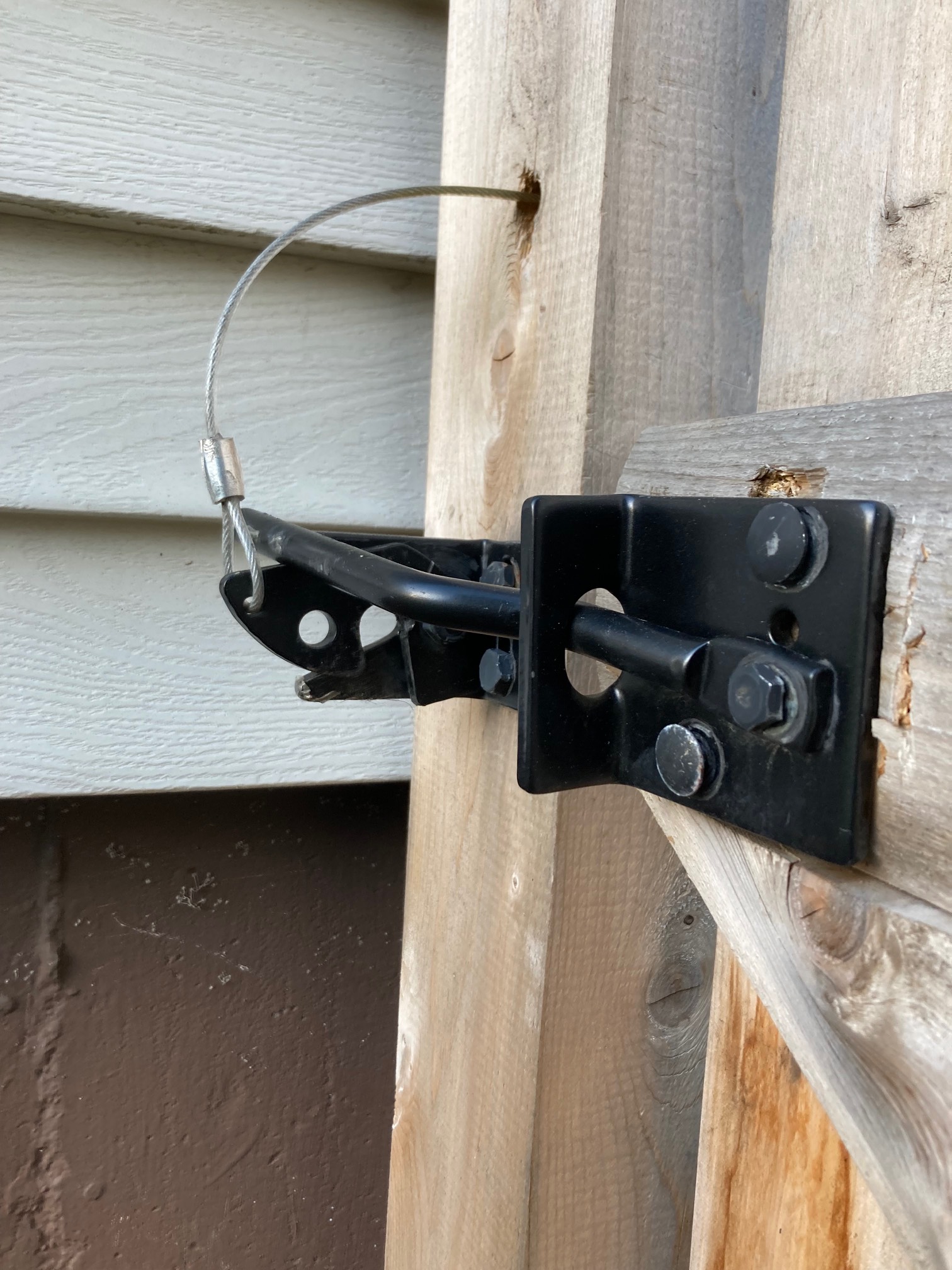 Gate with stick above the latch
