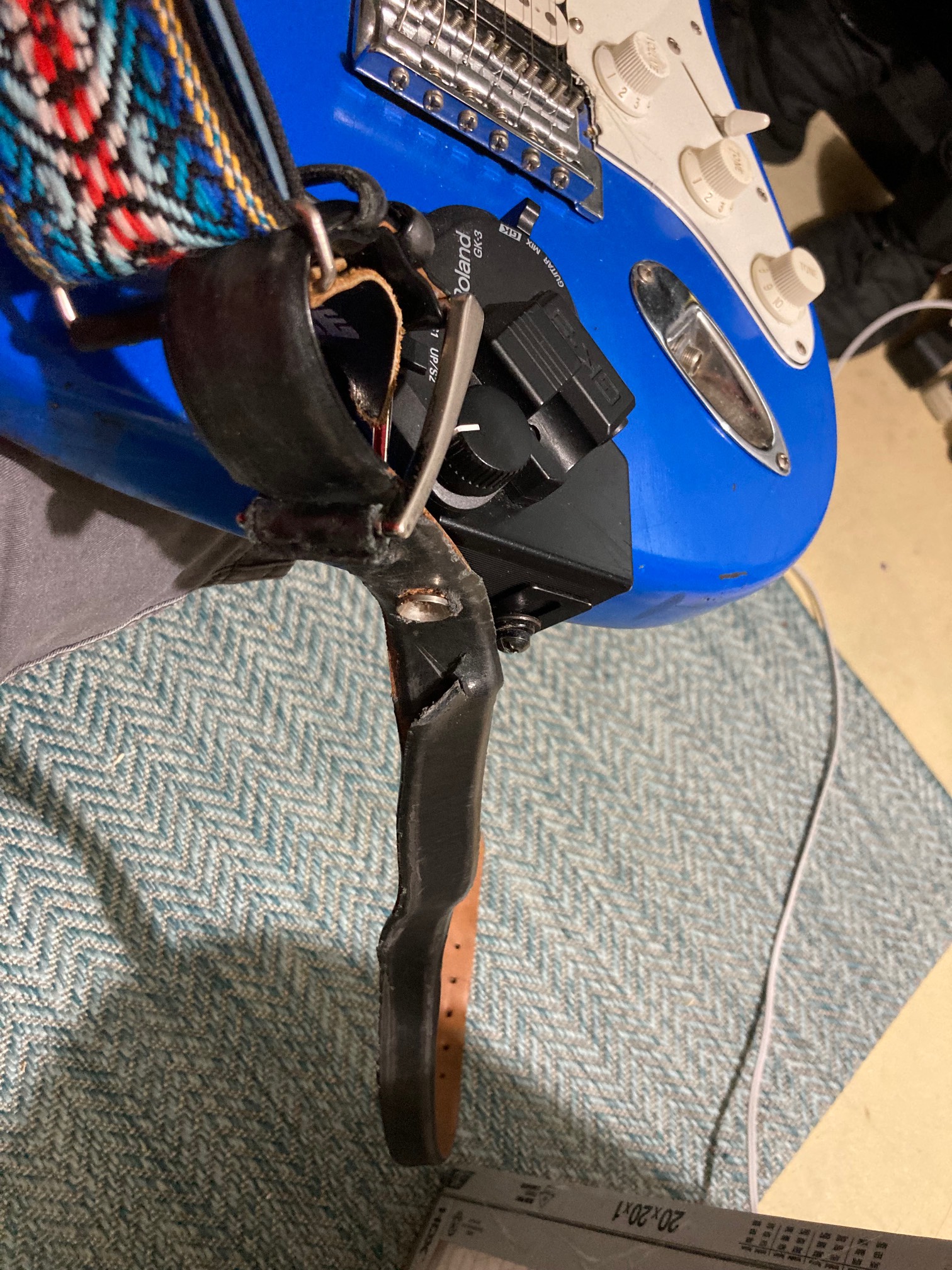 World’s worst guitar strap repair. It’s been tested successfully, though!
