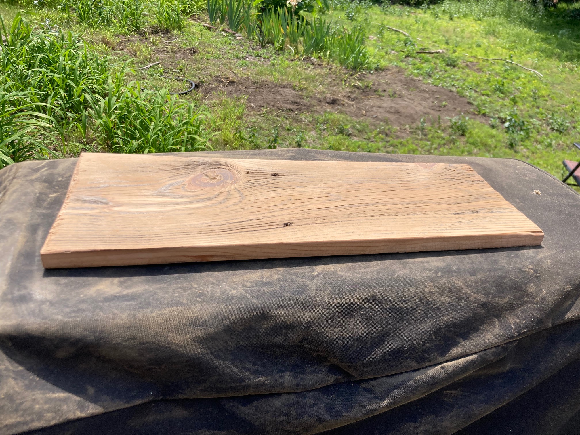Board with orangish yellow surface