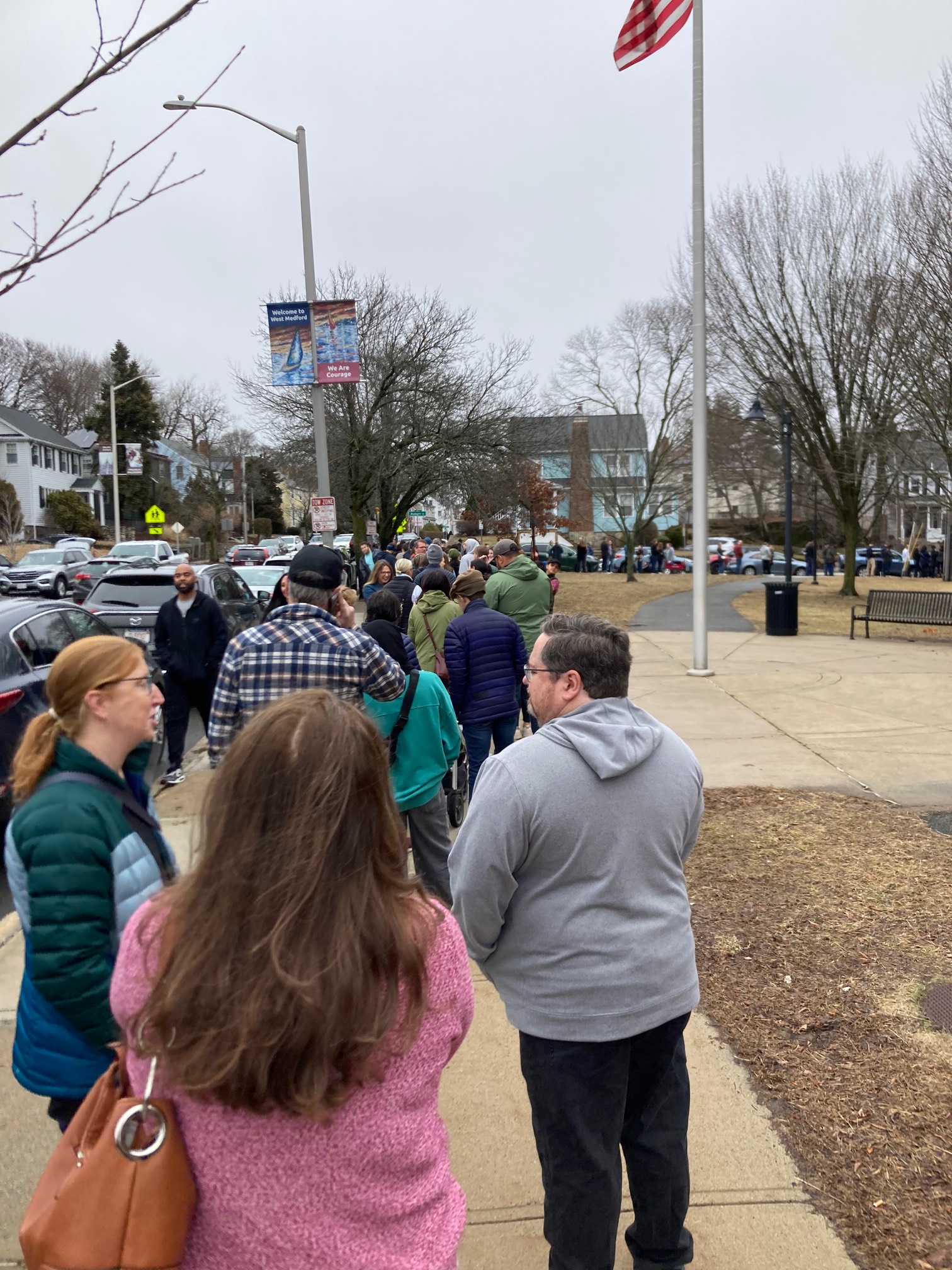 Long line of people outside of school