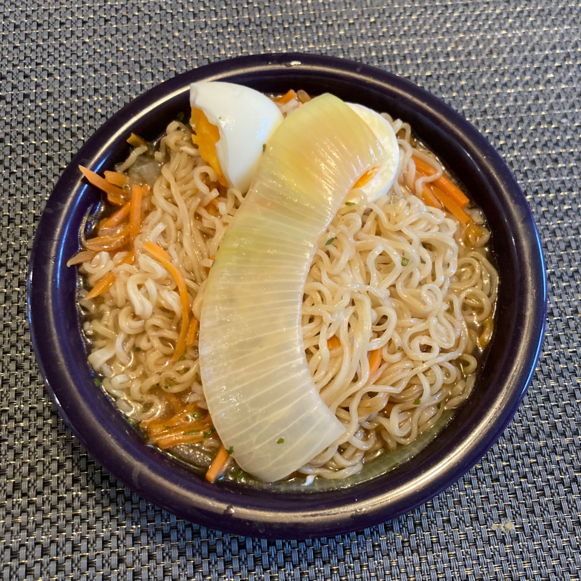 Extra wide onion strip review: Pretty tasty with the ramen juice on it, but inconvenient to eat.