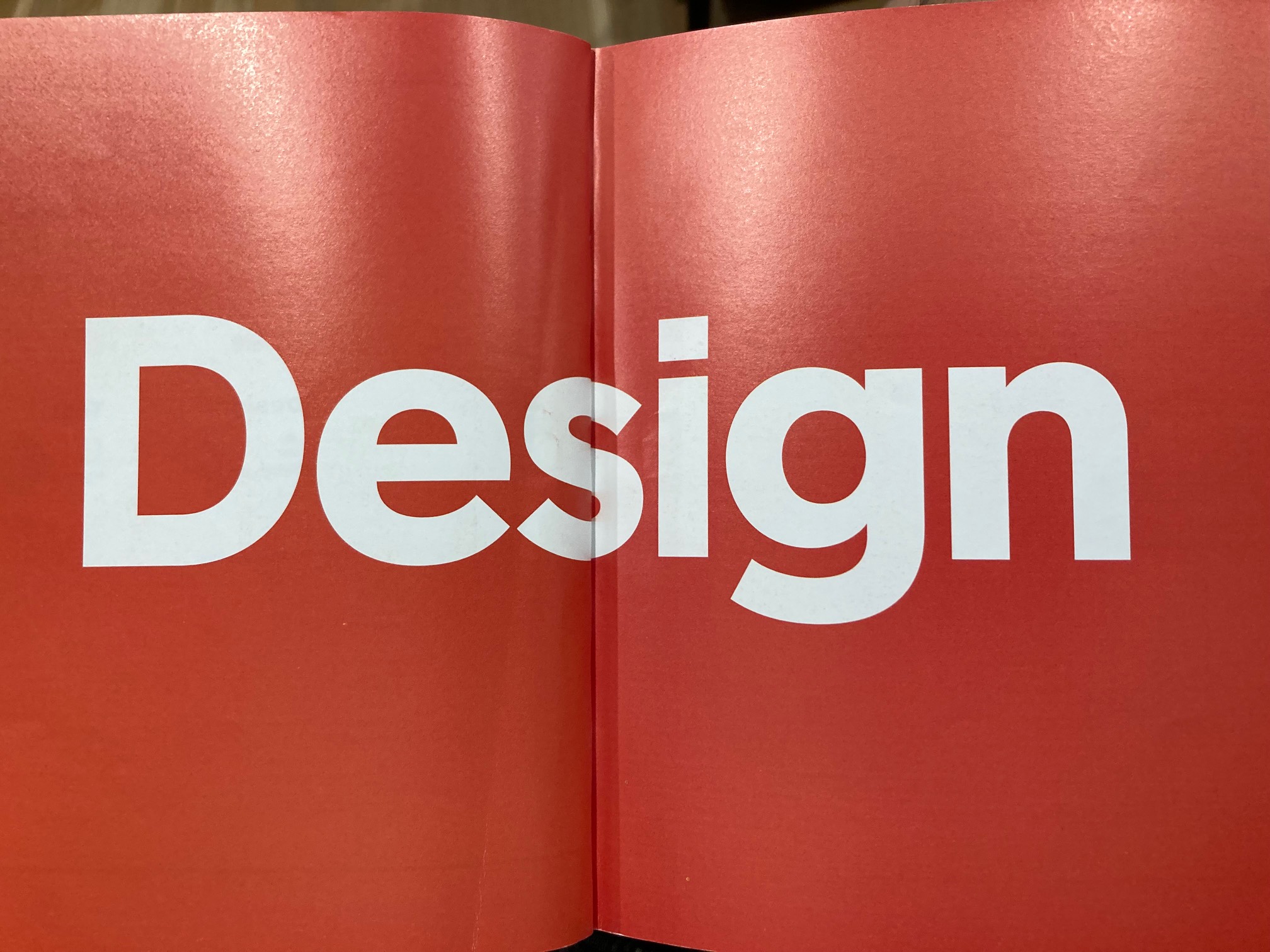 Yo, it’s Design! Sans serif and big on a solid color background. That’s as Design as it gets.