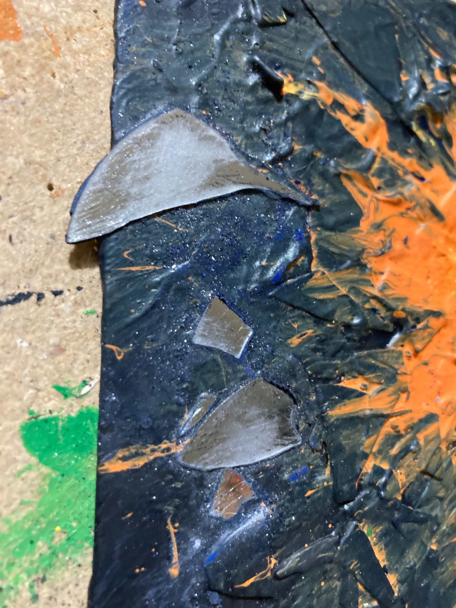 I thought I might have unexpected difficulties with sandpapering the paint off of these shards, but 